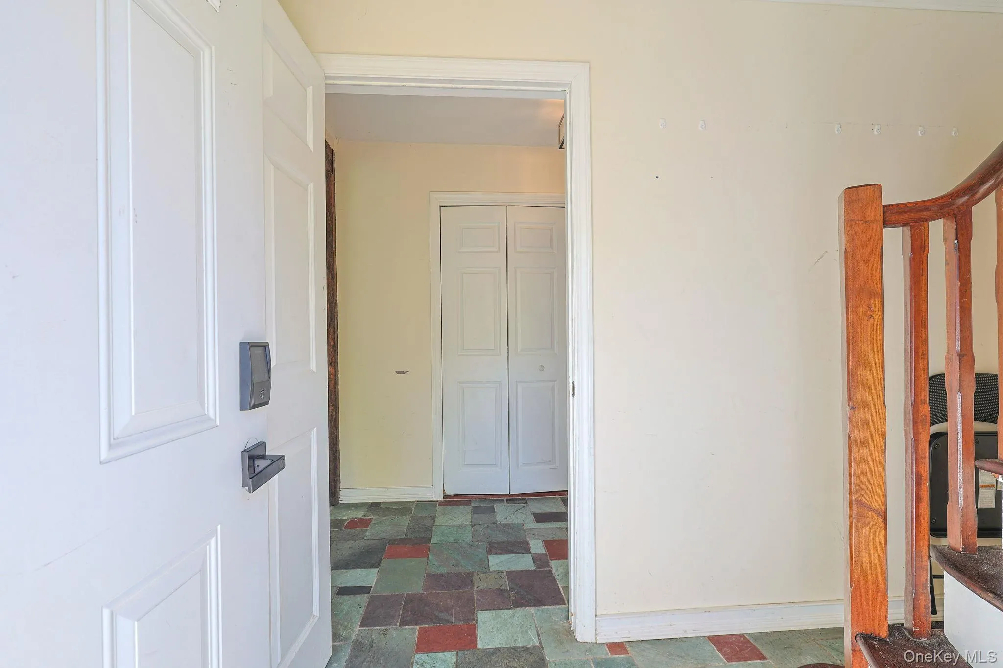 Foyer leading to Family Room as well as Upstairs Apartment Foyer leading to Family Room as well as Upstairs Apartment