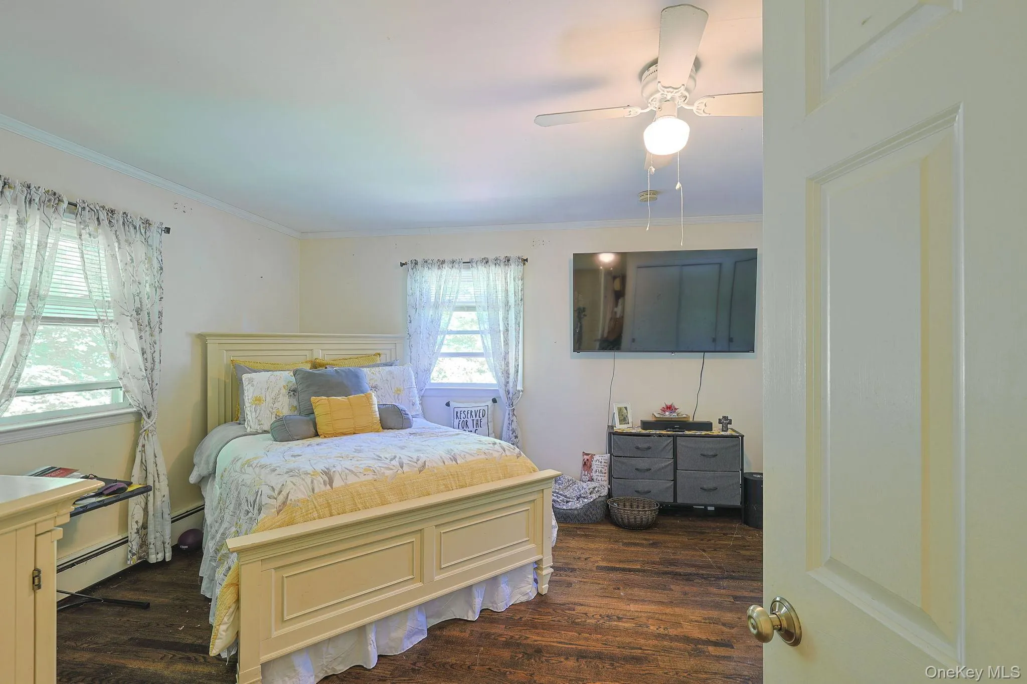 Spacious Bedroom with Hardwood Floors and plenty of Natural LightBedroom Spacious Bedroom with Hardwood Floors and plenty of Natural LightBedroom