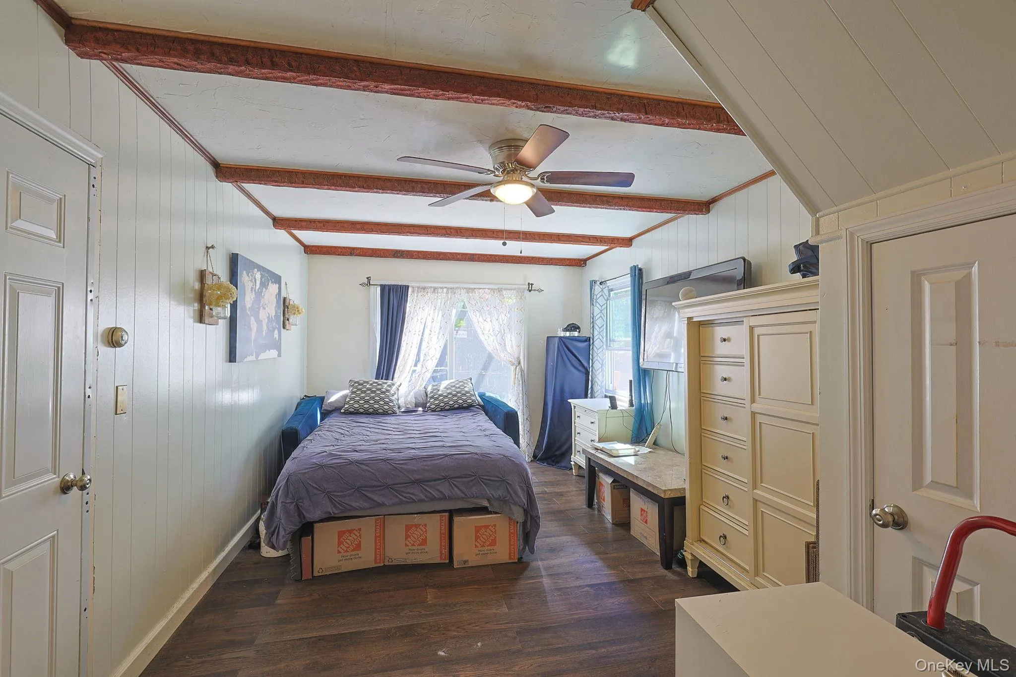 Family Room used as an extra bedroom, Sliding Glass Doors Leading to outside sitting area Family Room used as an extra bedroom, Sliding Glass Doors Leading to outside sitting area