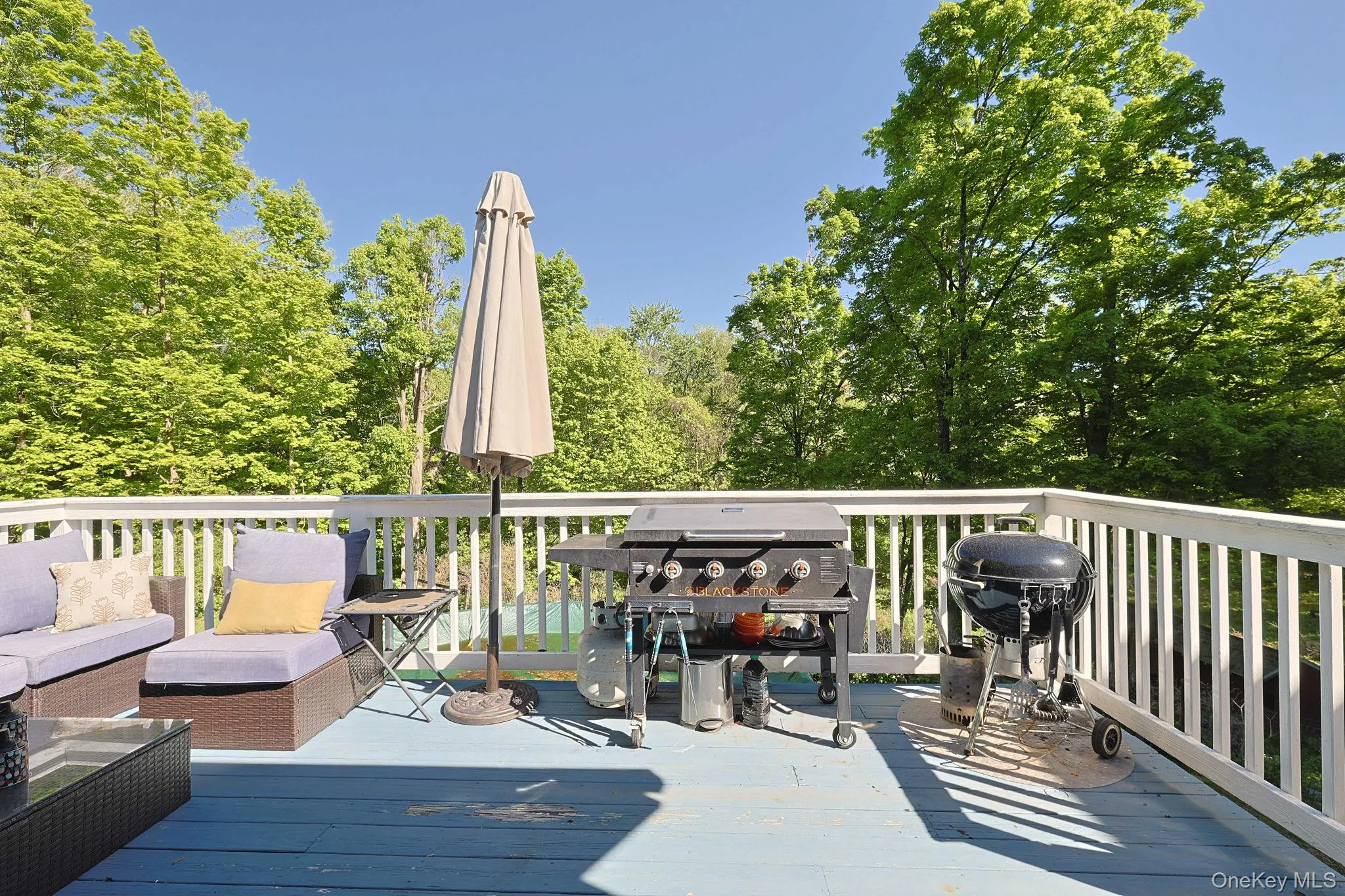 Sliding Glass Doors lead to the Deck off the main Kitchen Sliding Glass Doors lead to the Deck off the main Kitchen