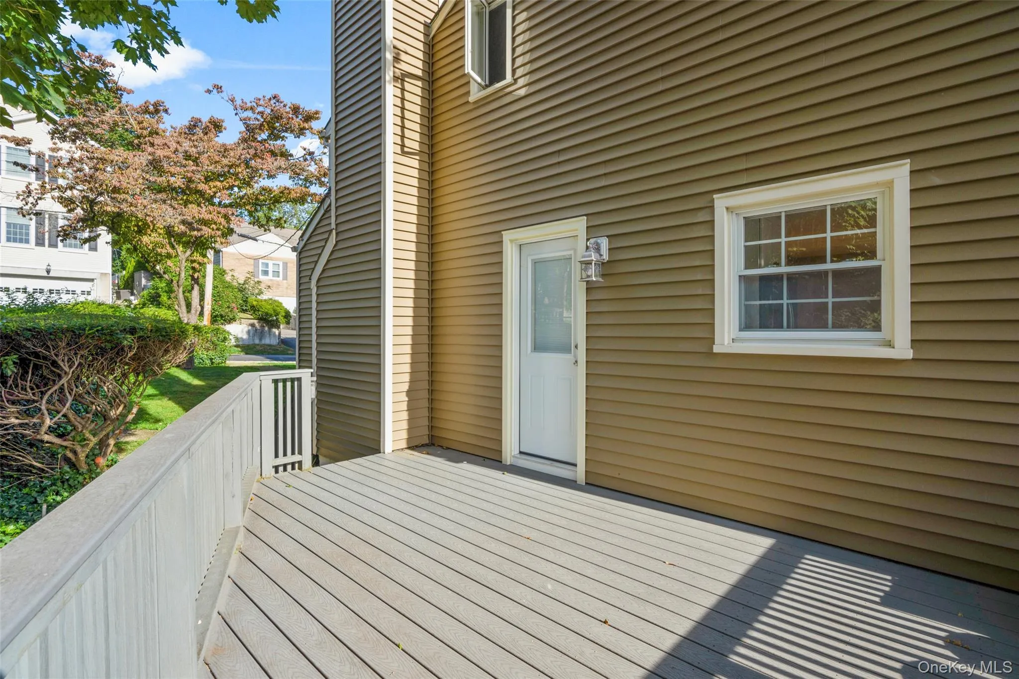 Right off kitchen, with stairs down to side yard. Right off kitchen, with stairs down to side yard.