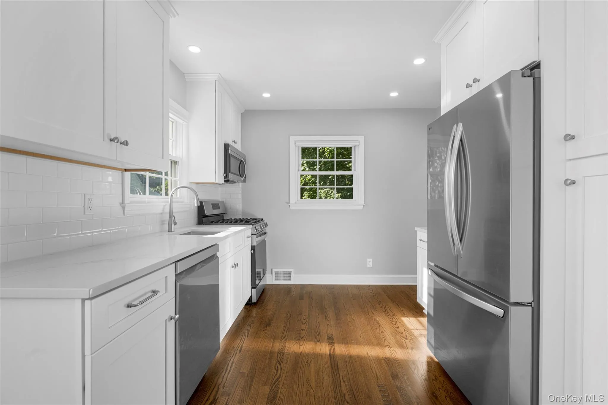 Kitchen has door to deck. Kitchen has door to deck.