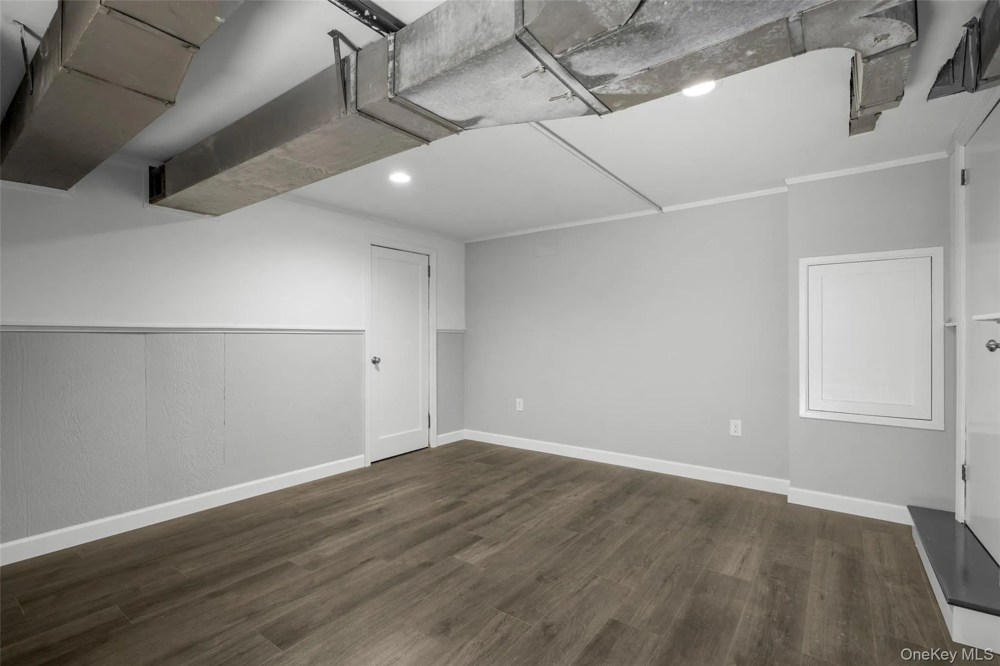 Lower level recreation room, plus laundry room, huge storage room and door to yard. Lower level recreation room, plus laundry room, huge storage room and door to yard.