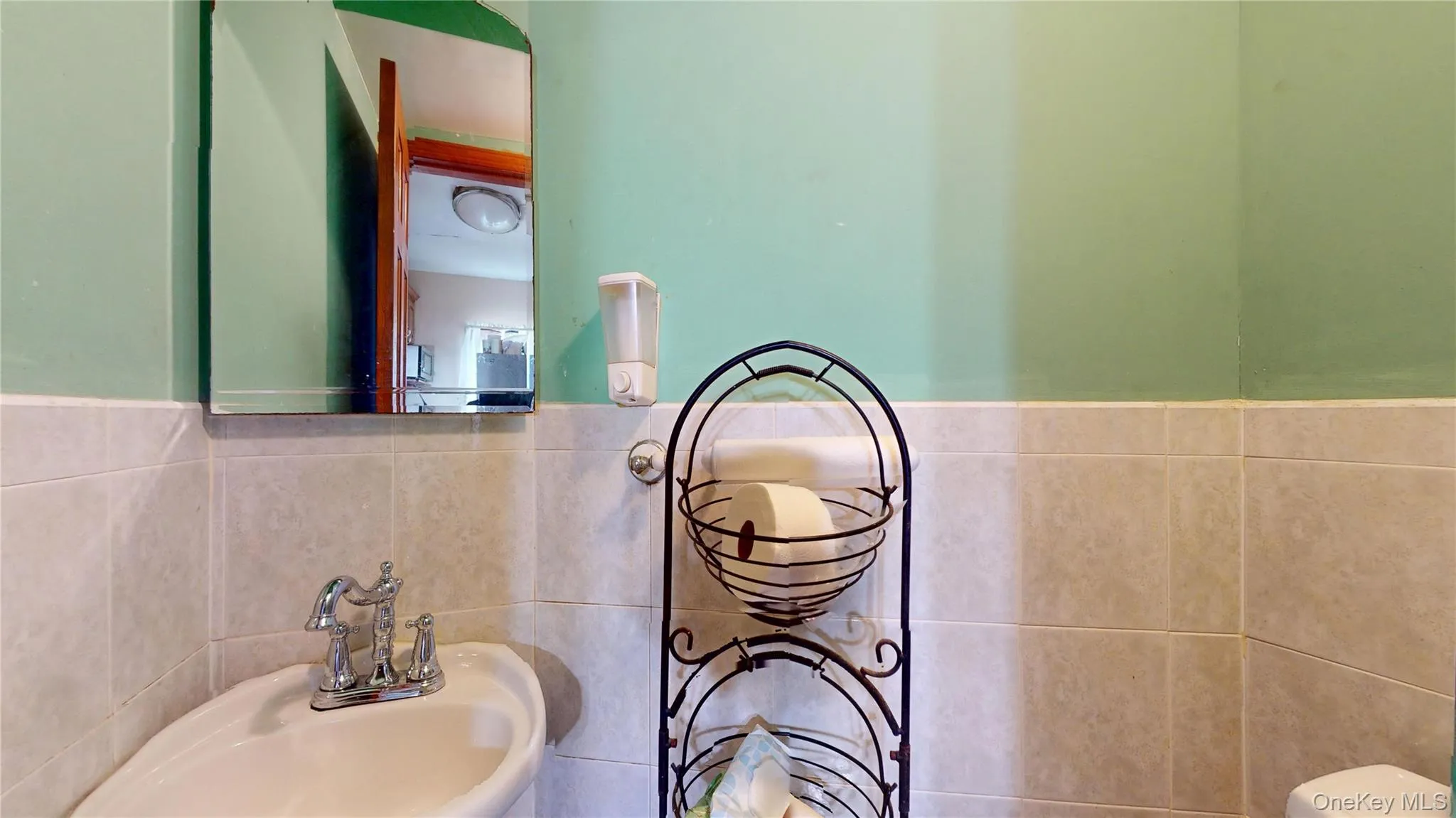 Half bath off the kitchen Half bath off the kitchen
