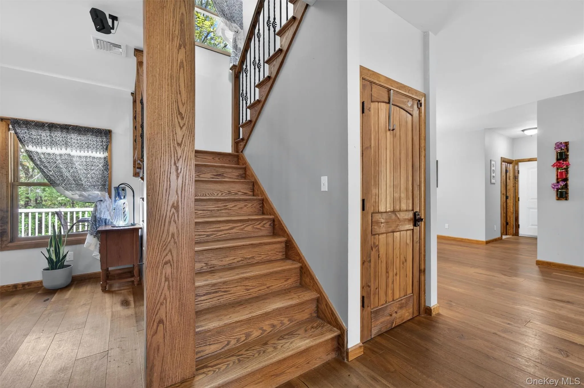 A beautifully positioned central staircase provides an elegant transition from the main level to the second floor. A beautifully positioned central staircase provides an elegant transition from the main level to the second floor.