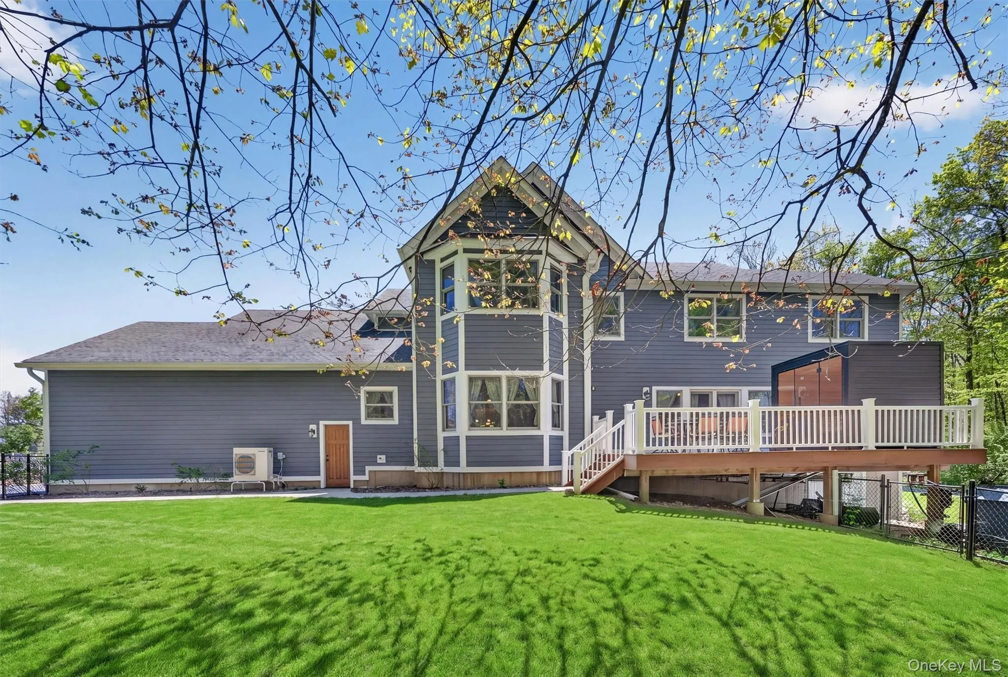 The rear lawn offers is fully fenced, providing a lush, level landscape for play, gardening, or future expansion. The rear lawn offers is fully fenced, providing a lush, level landscape for play, gardening, or future expansion.