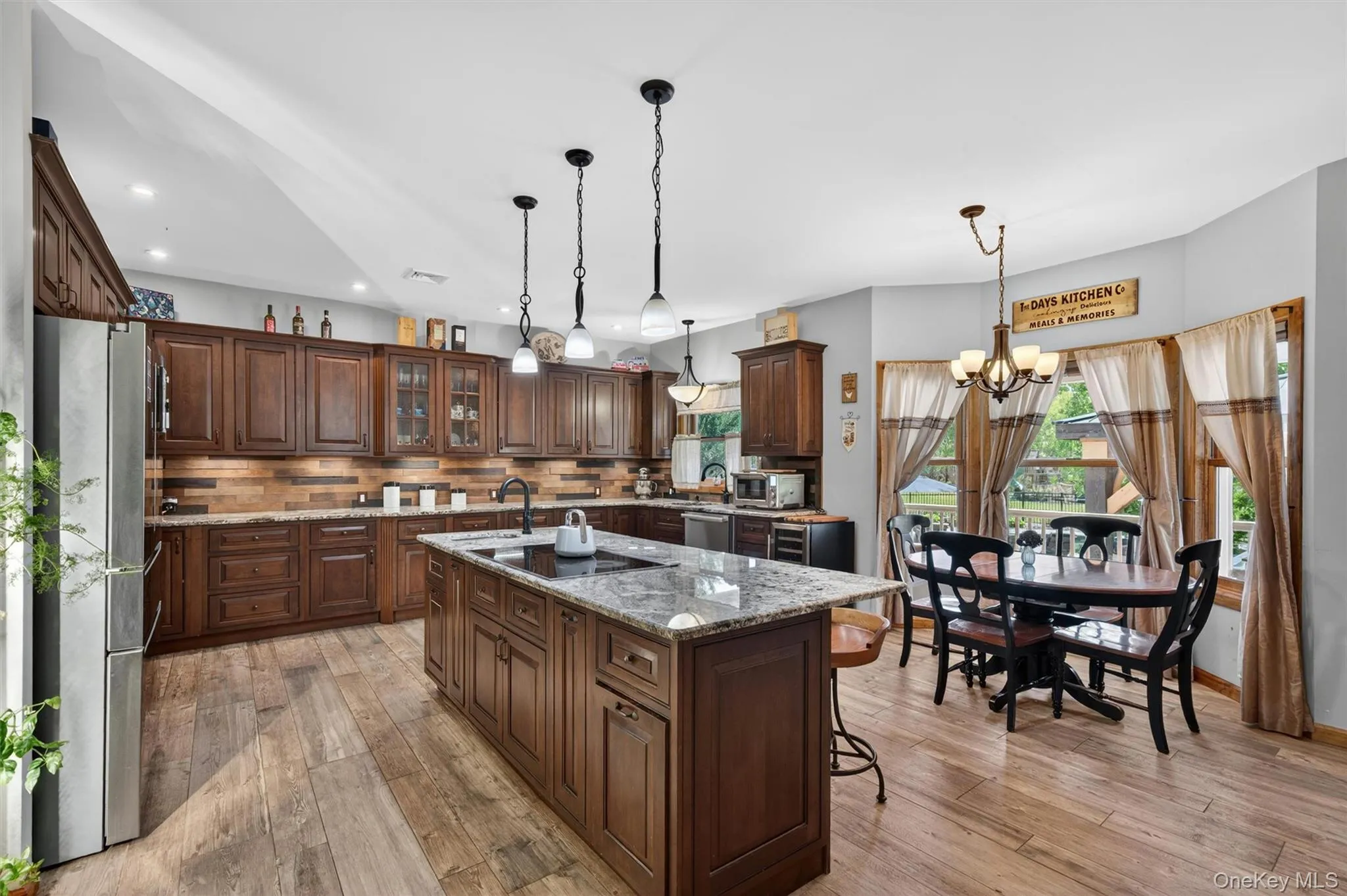 The natural flow from the dining room opens to a grand kitchen--the heart of the home. The natural flow from the dining room opens to a grand kitchen--the heart of the home.