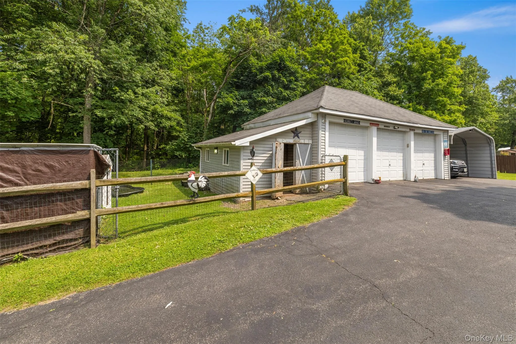 3 car detached garage with heat & electric and a two-car carport. 3 car detached garage with heat & electric and a two-car carport.