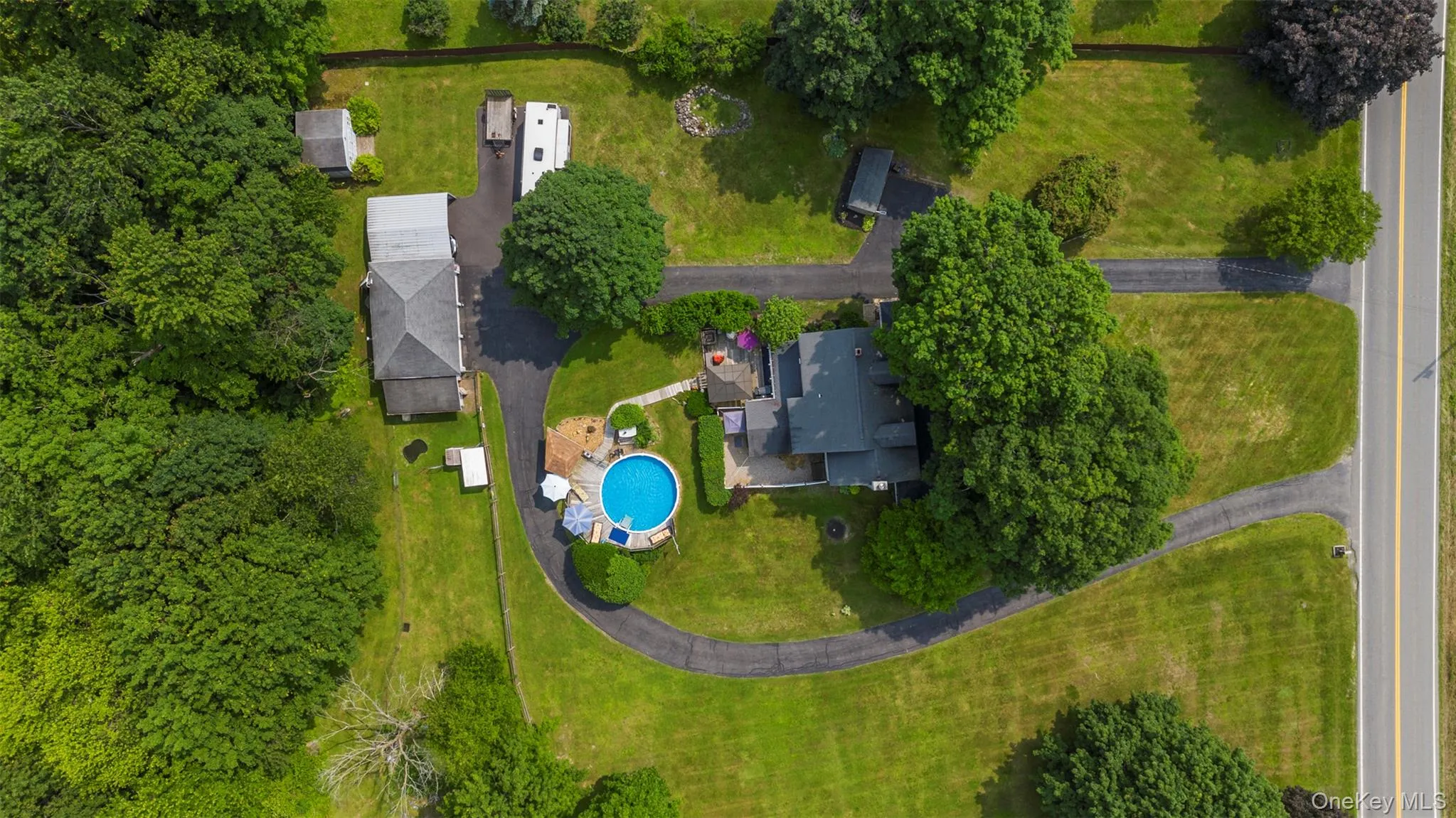 Detached 3-car garage, two sheds, above ground pool, pond, fenced in area with chicken coop! Detached 3-car garage, two sheds, above ground pool, pond, fenced in area with chicken coop!