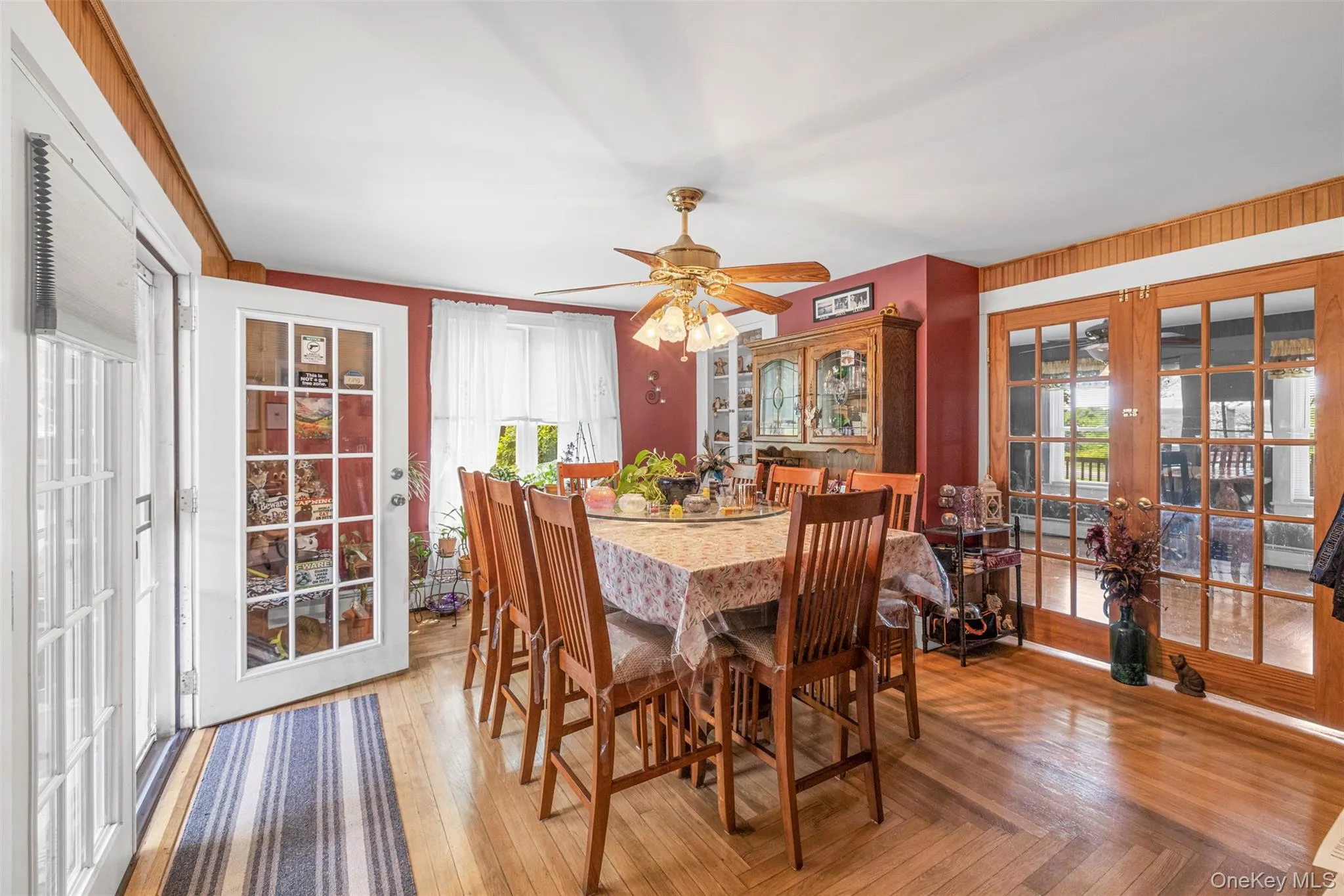Formal dining room with French doors leading to back deck Formal dining room with French doors leading to back deck