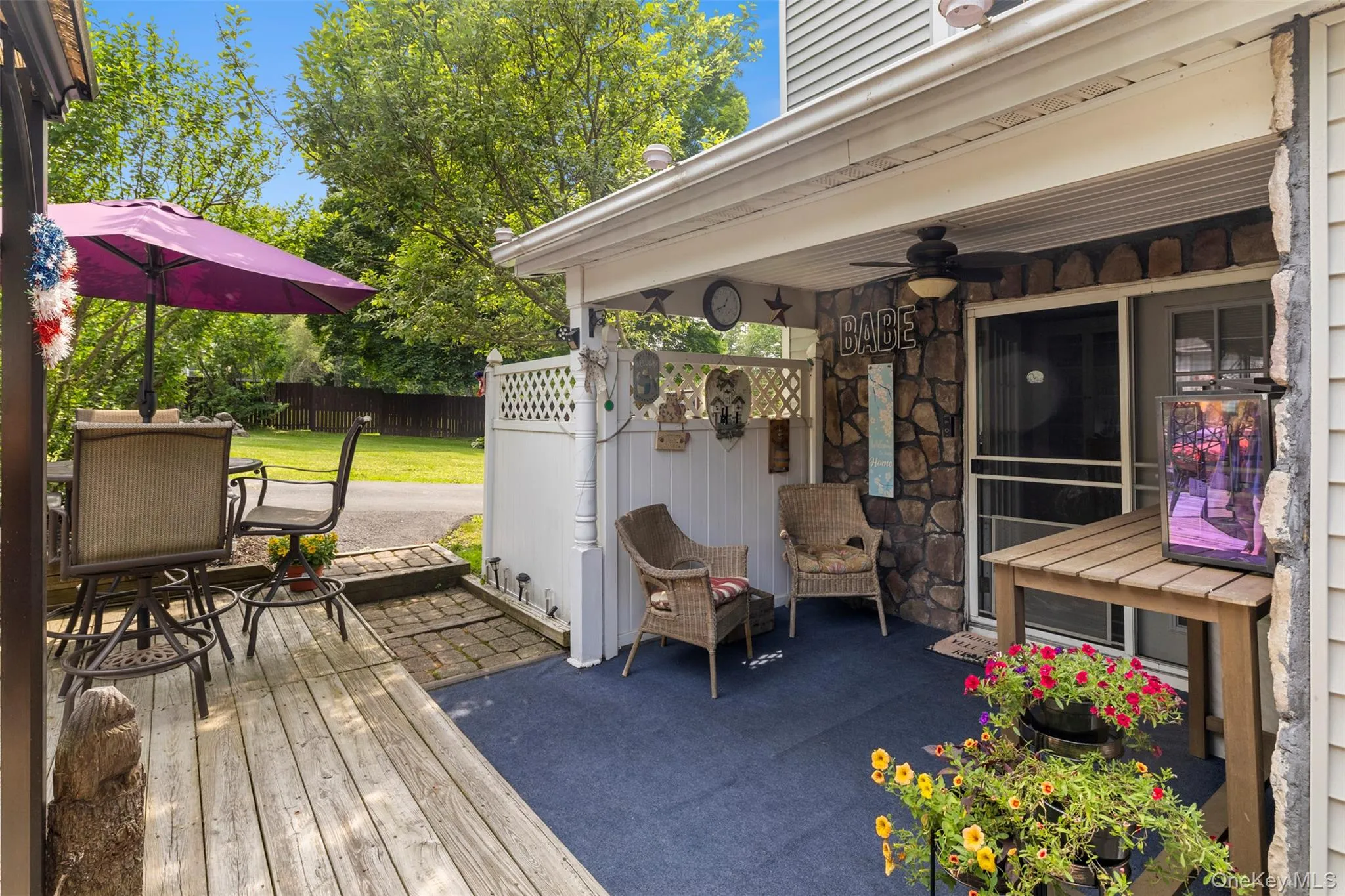 Deck with ceiling fan and a patio Deck with ceiling fan and a patio