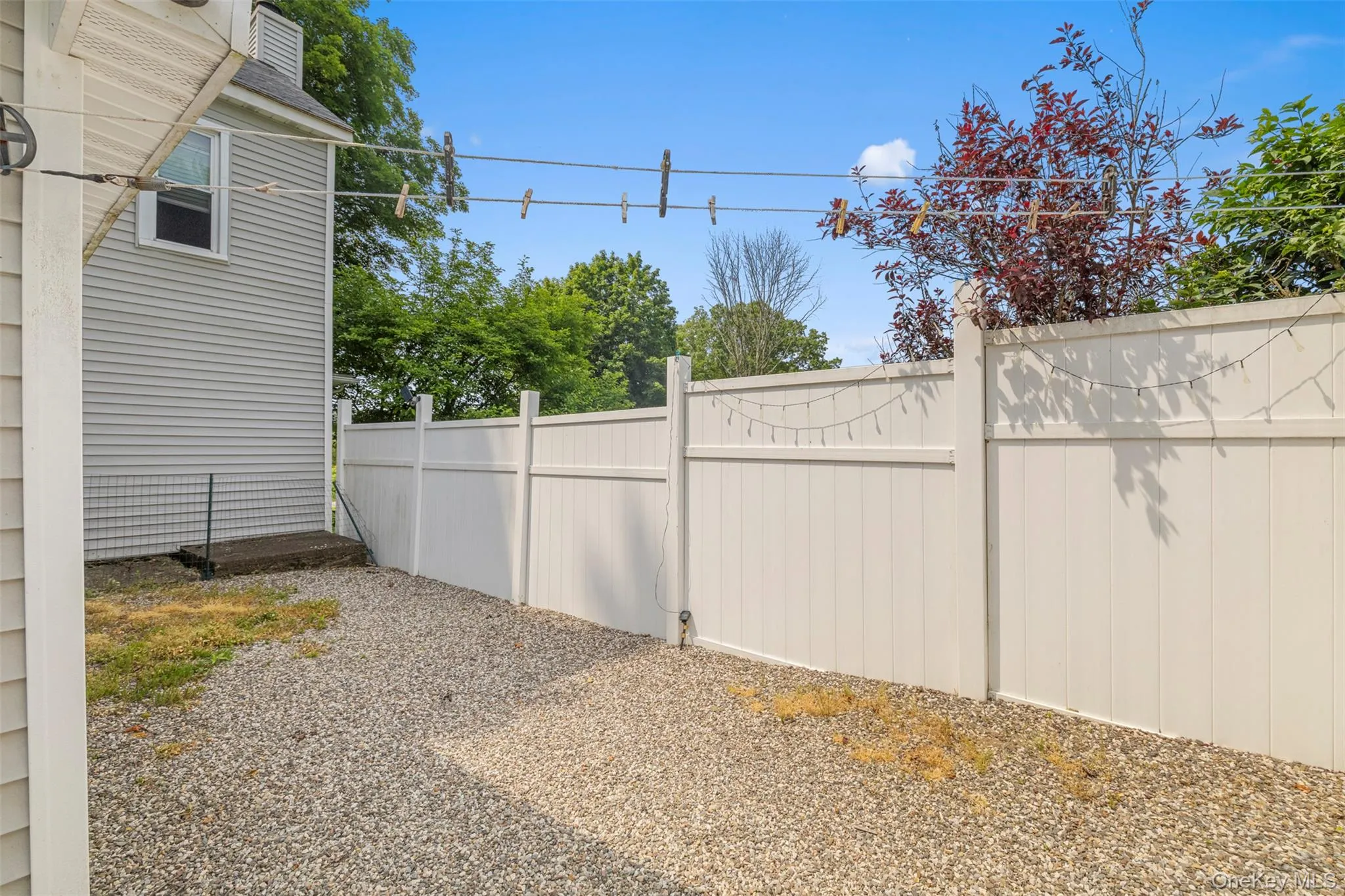 Fenced in area off of the laundry room Fenced in area off of the laundry room