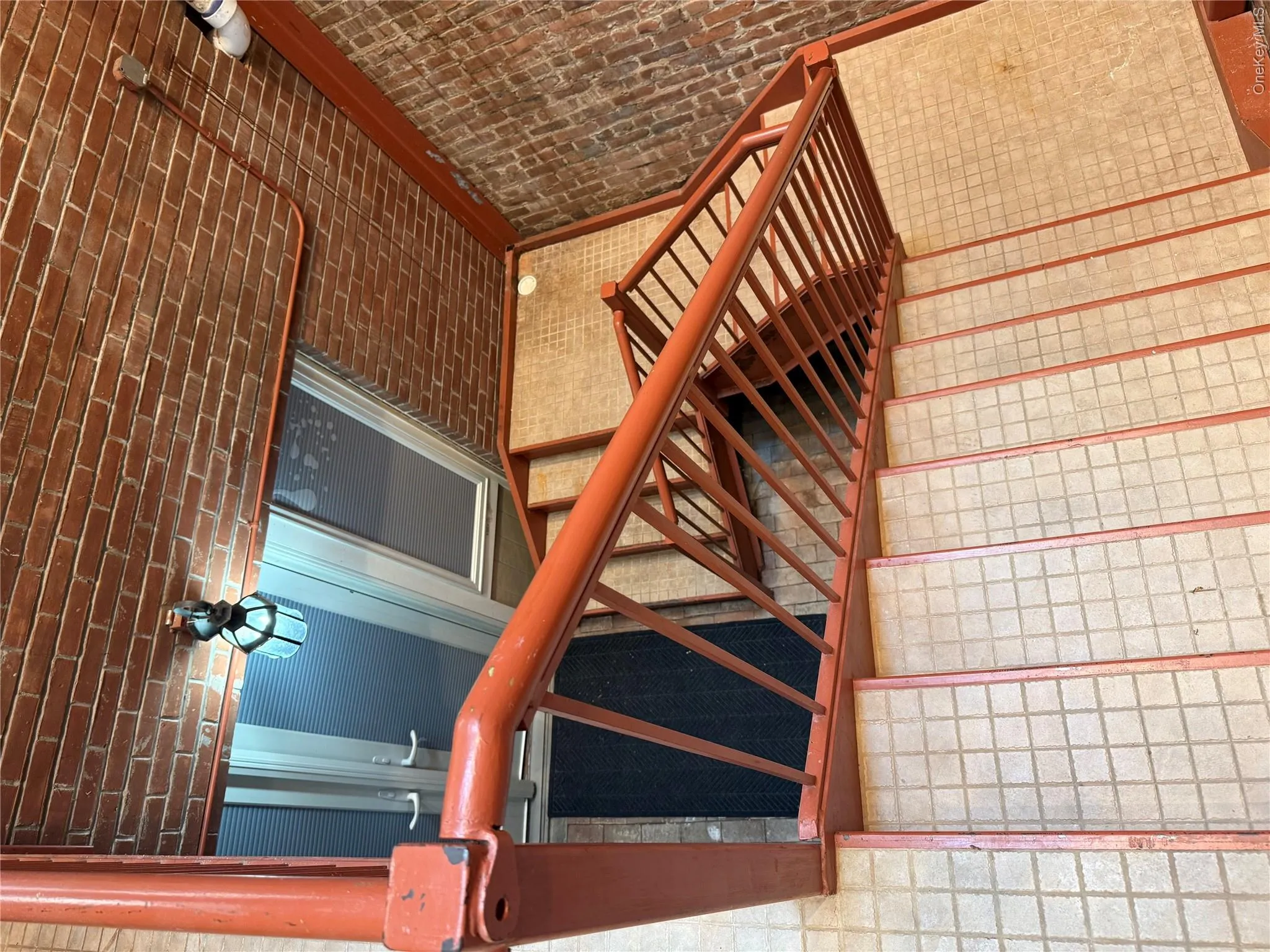 Stairwell from retail space to lower level, but there is a second entry as well Stairwell from retail space to lower level, but there is a second entry as well