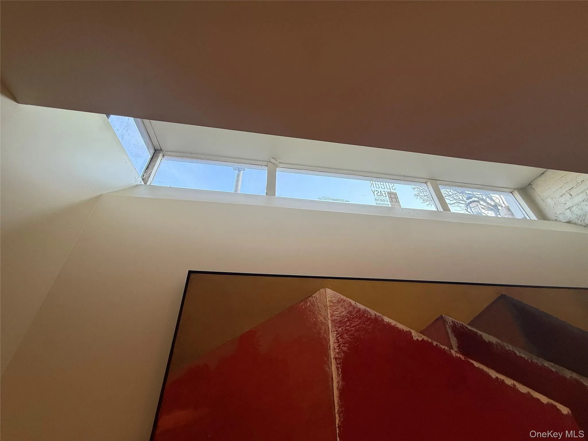 "back" office with lightwell/skylight up to street level "back" office with lightwell/skylight up to street level