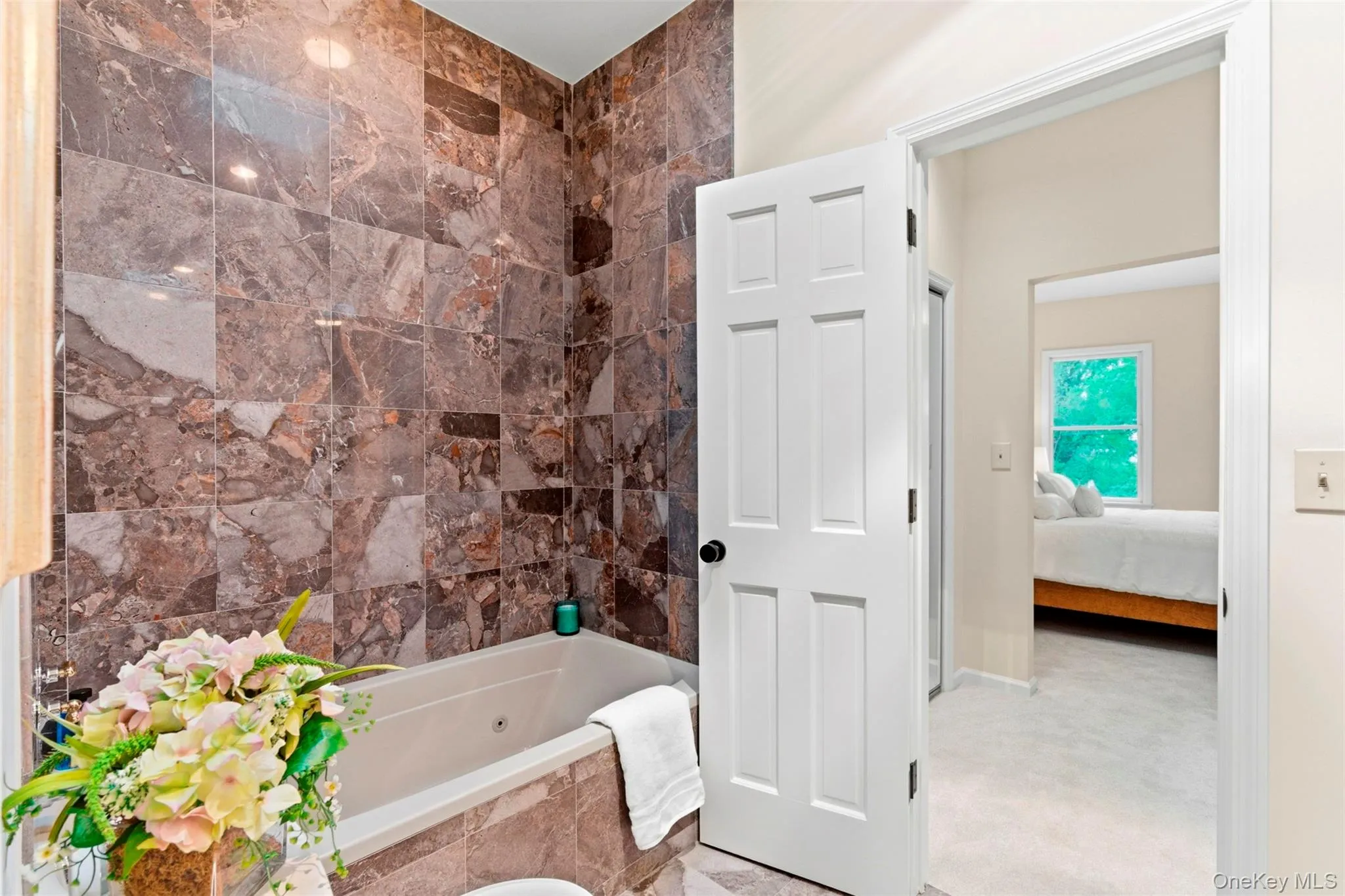 Primary en-suite bath with jetted tub. Primary en-suite bath with jetted tub.