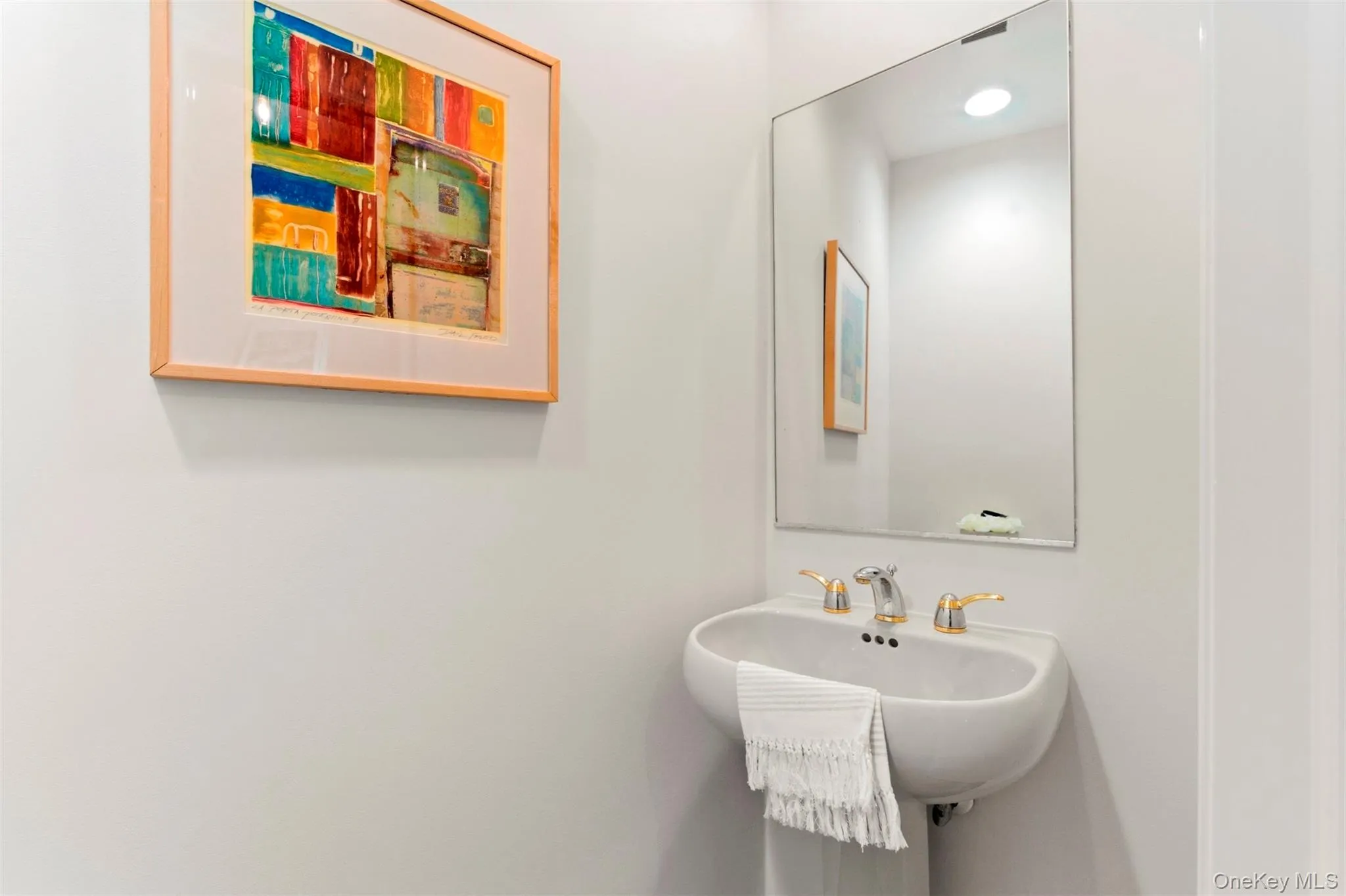Guest half-bath on the main level. Guest half-bath on the main level.