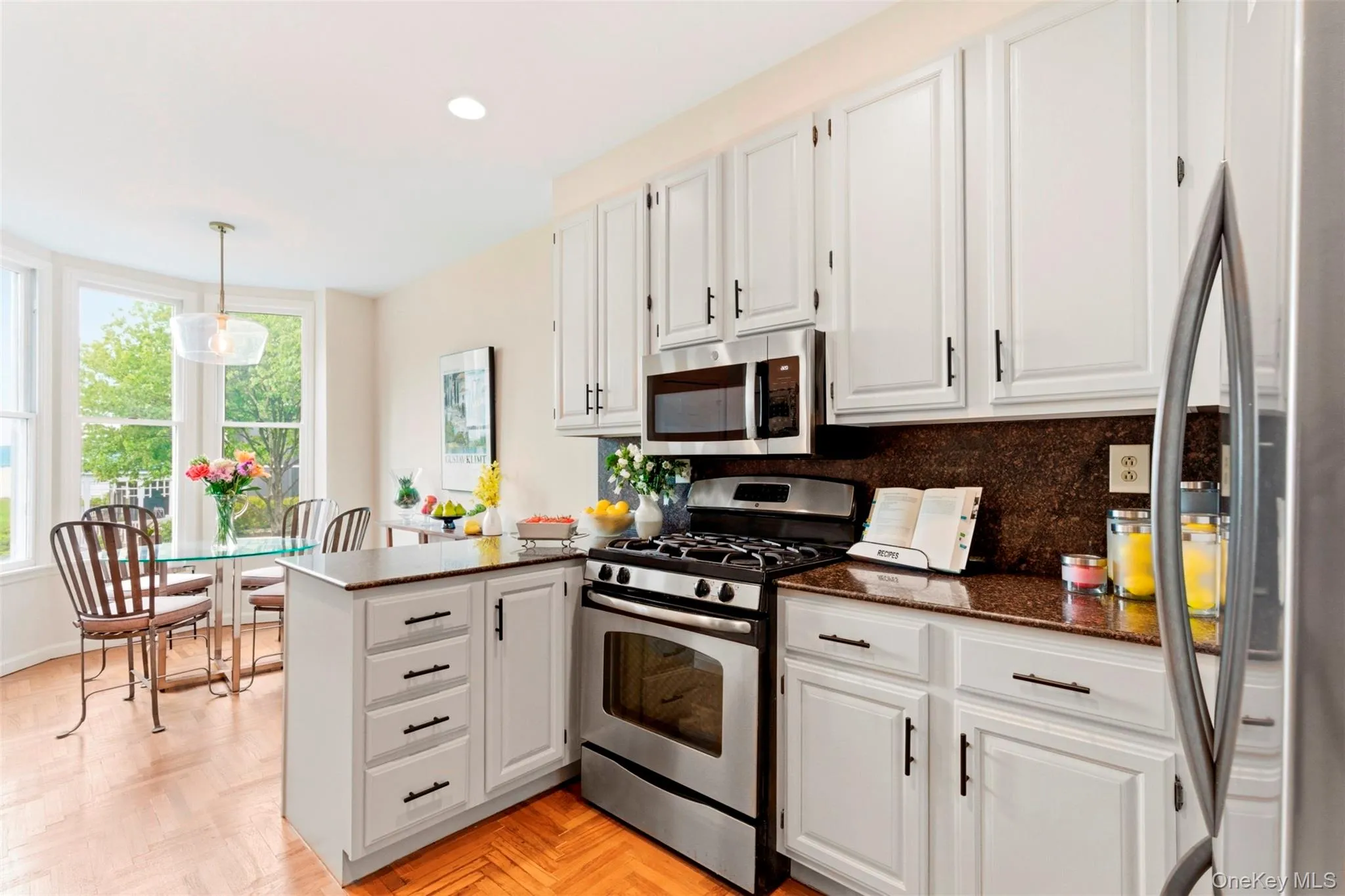 Eat-in Kitchen with stainless steel appliances and granite counters. Eat-in Kitchen with stainless steel appliances and granite counters.