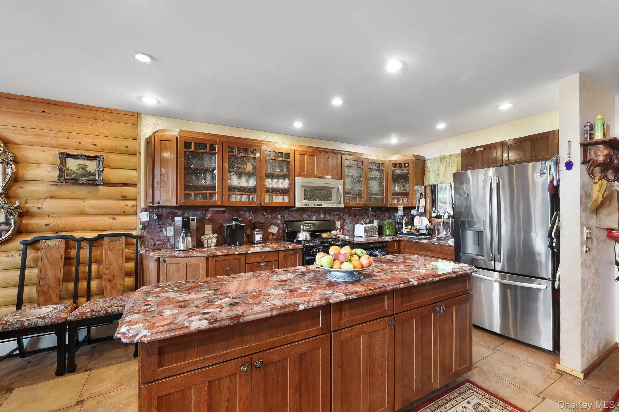 Kitchen with stainless appliances and island Kitchen with stainless appliances and island