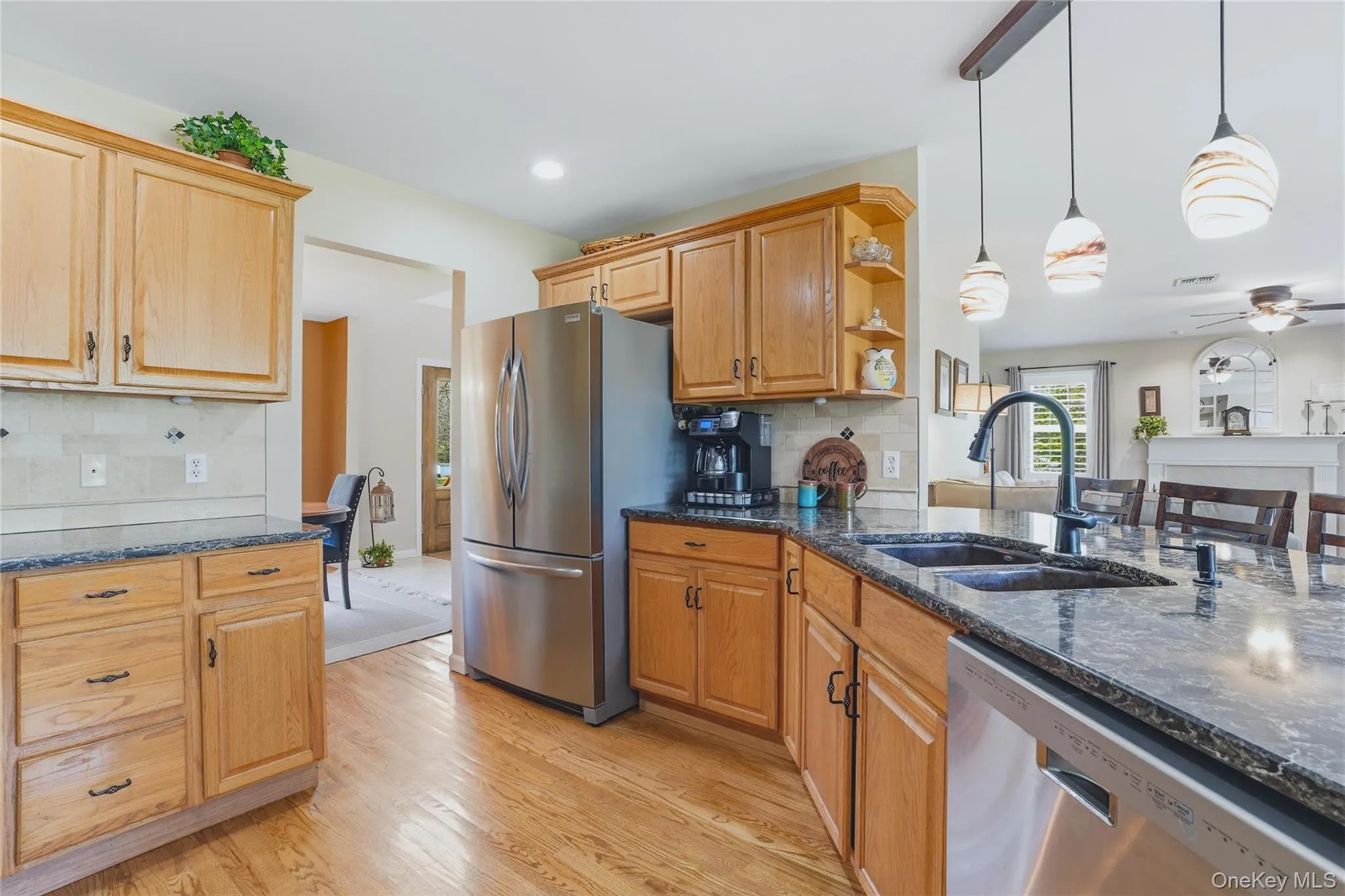 The formal dining room is perfectly situated right off of the kitchen The formal dining room is perfectly situated right off of the kitchen