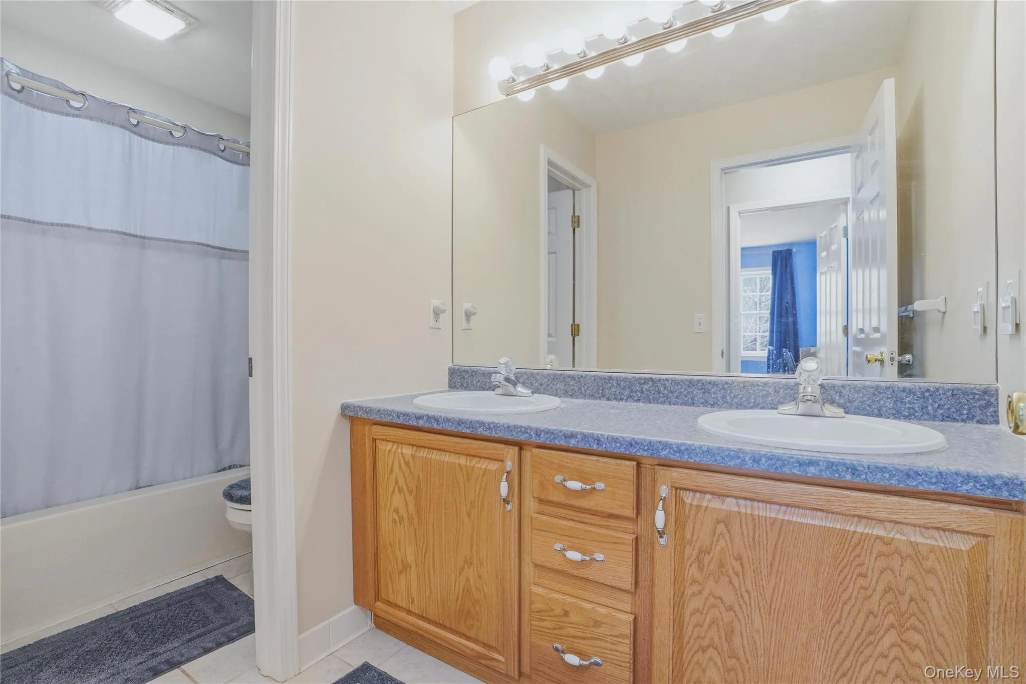Full bathroom in hallway of upper level Full bathroom in hallway of upper level