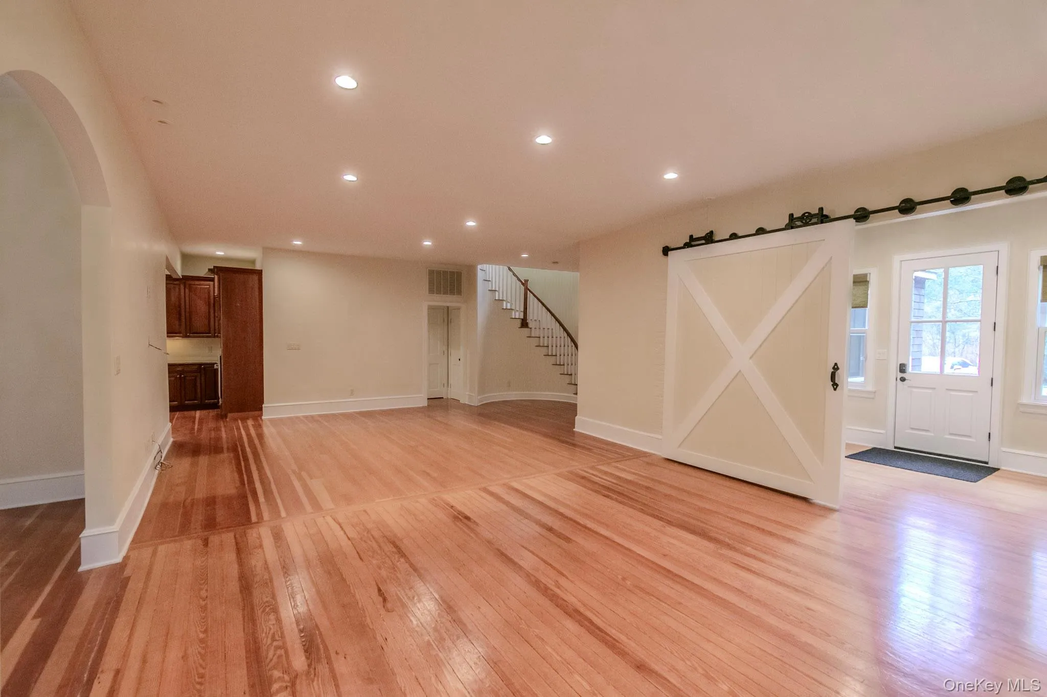 Entrance foyer with light hardwood / wood-style floors Entrance foyer with light hardwood / wood-style floors