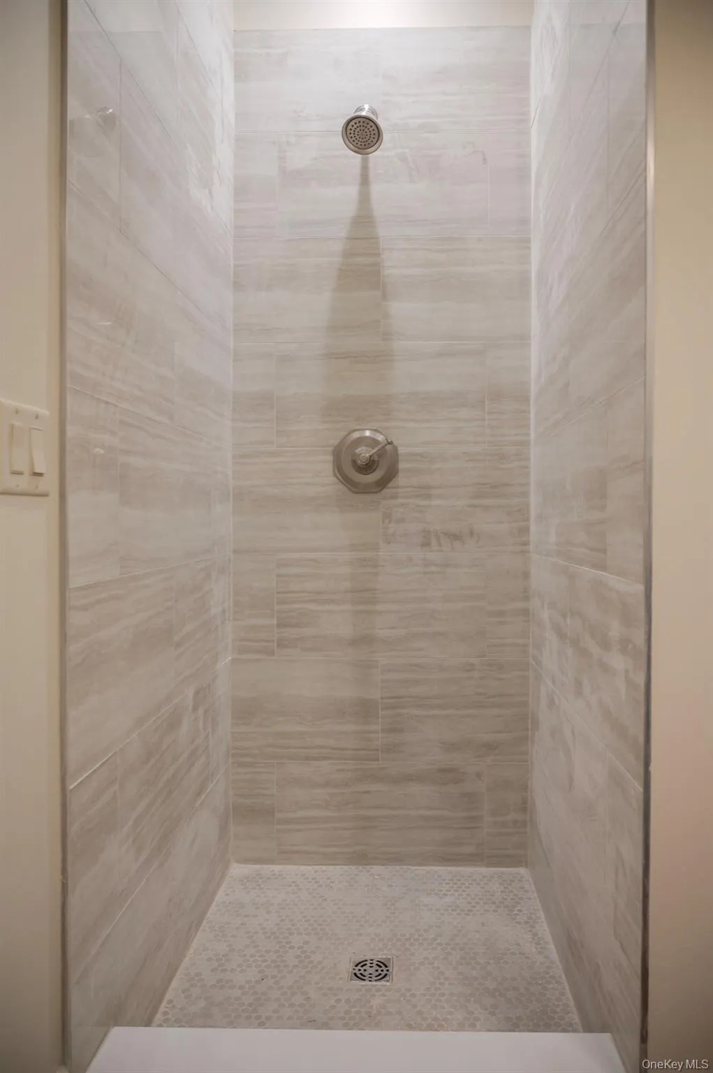 Bathroom with tiled shower Bathroom with tiled shower