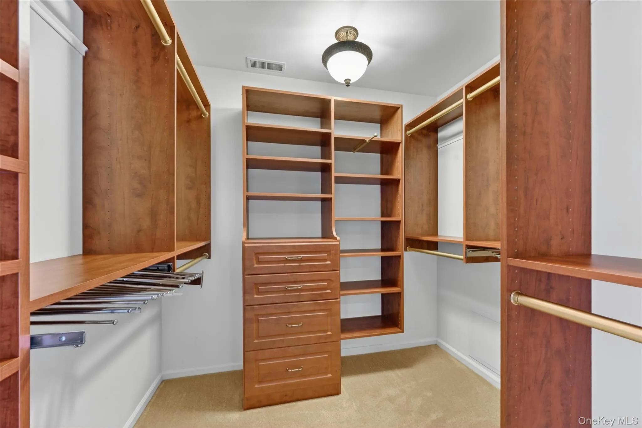 Primary walk in closet Primary walk in closet