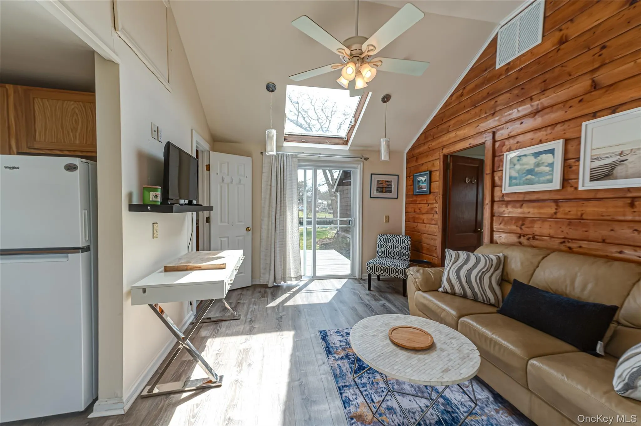 full view of cottage facing back deck. full view of cottage facing back deck.