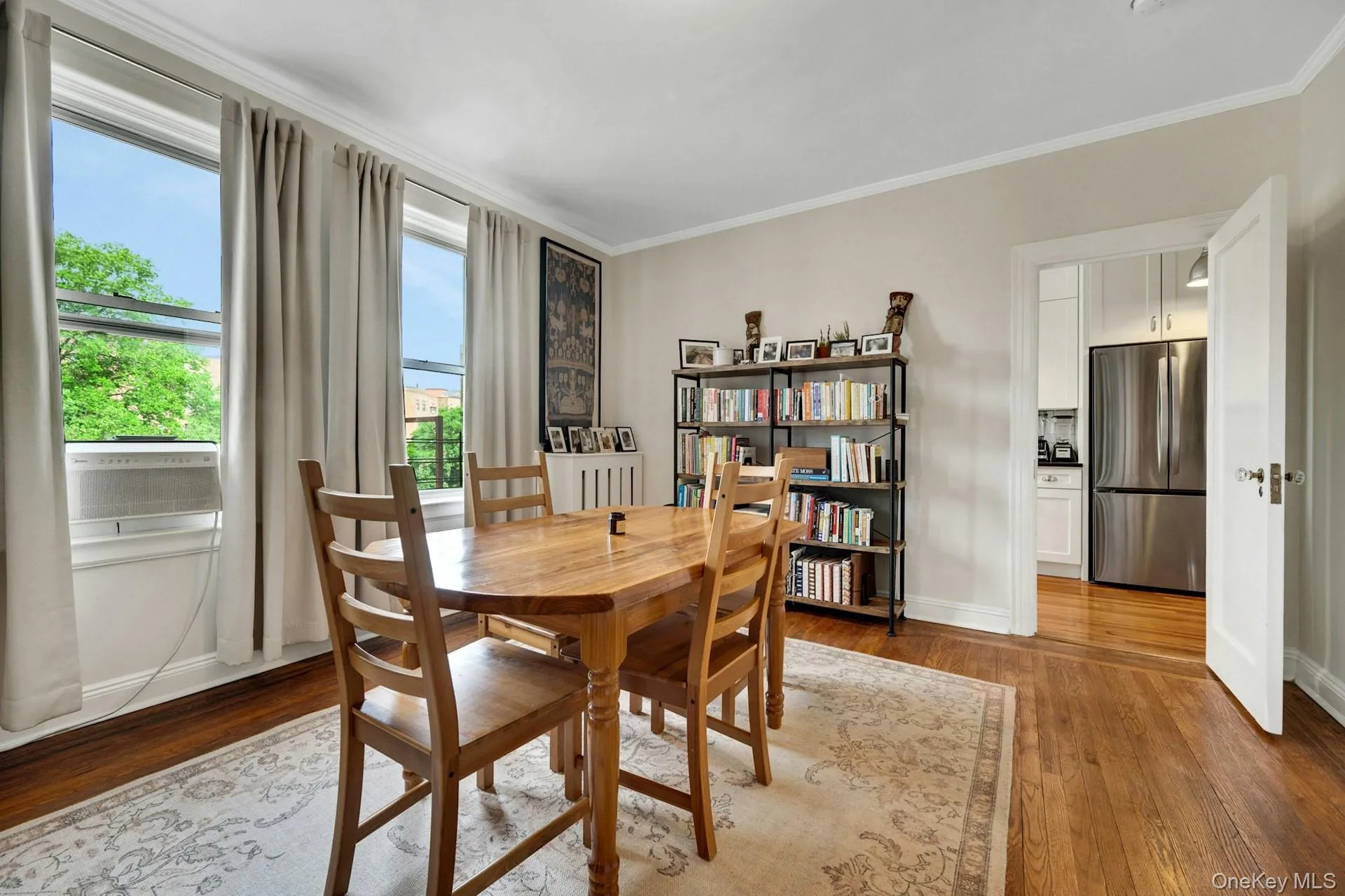 This room is being used as a dining room, but it is the second bedroom and has a closet. This room is being used as a dining room, but it is the second bedroom and has a closet.