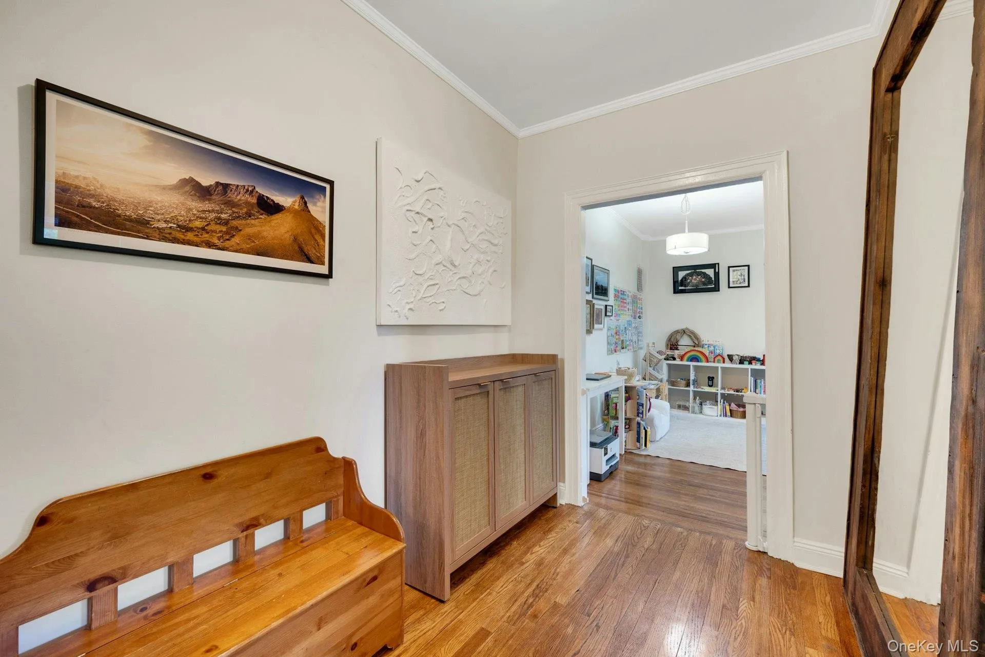 There is enough space in the foyer for bookcases and a desk. There is enough space in the foyer for bookcases and a desk.