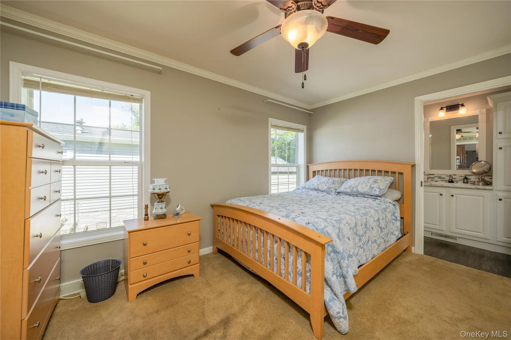 9 - Primary bedroom with ceiling fan and big windows 9 - Primary bedroom with ceiling fan and big windows