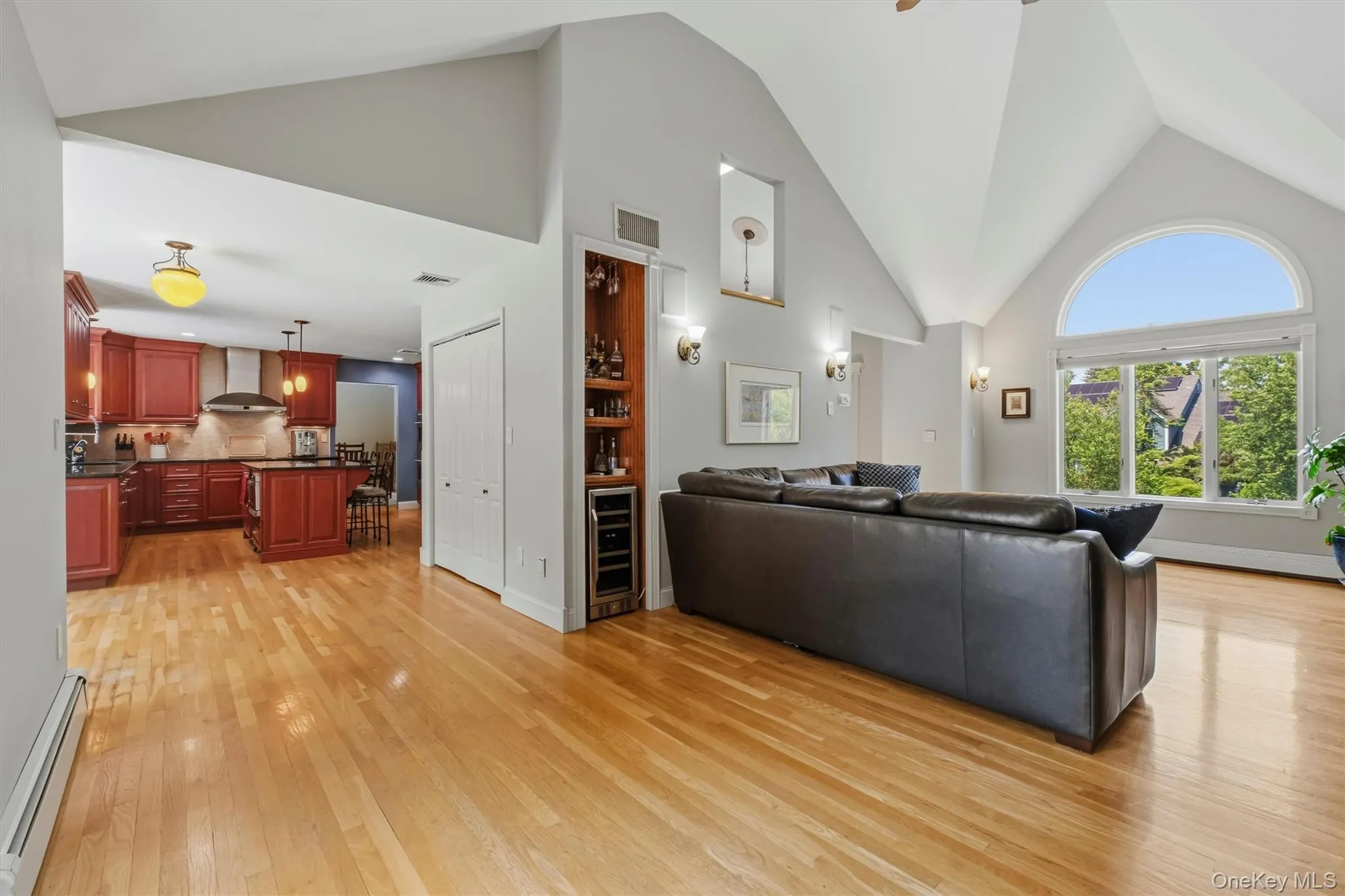 Dramatic ceilings with opening to stairway to second floor. Dramatic ceilings with opening to stairway to second floor.