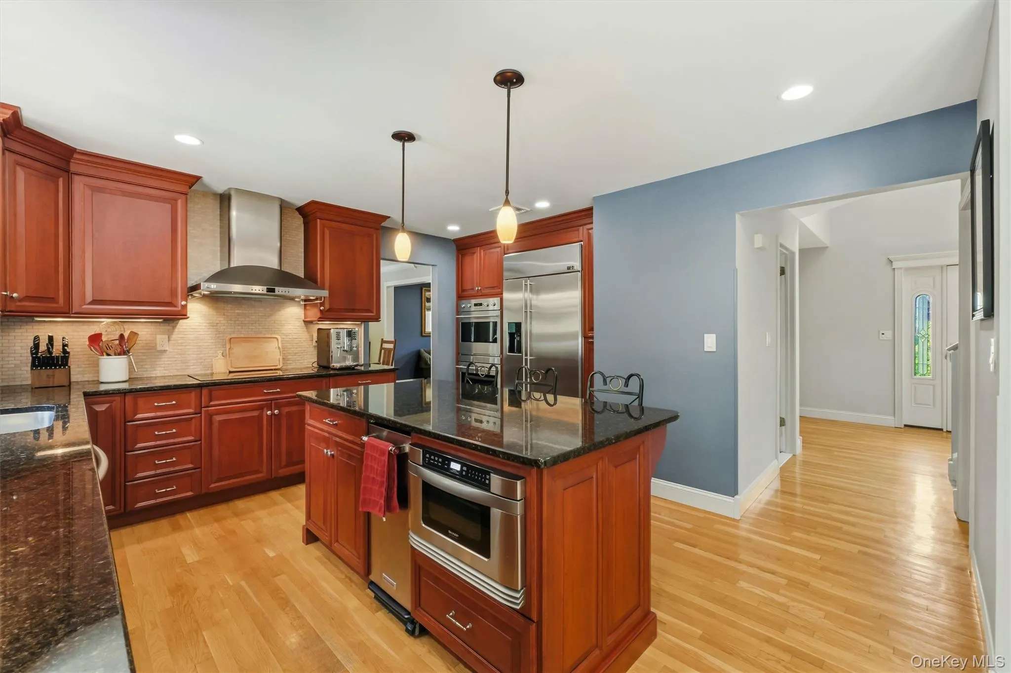 Photo showing kitchen, ideally open to front hall to greet guests. Photo showing kitchen, ideally open to front hall to greet guests.