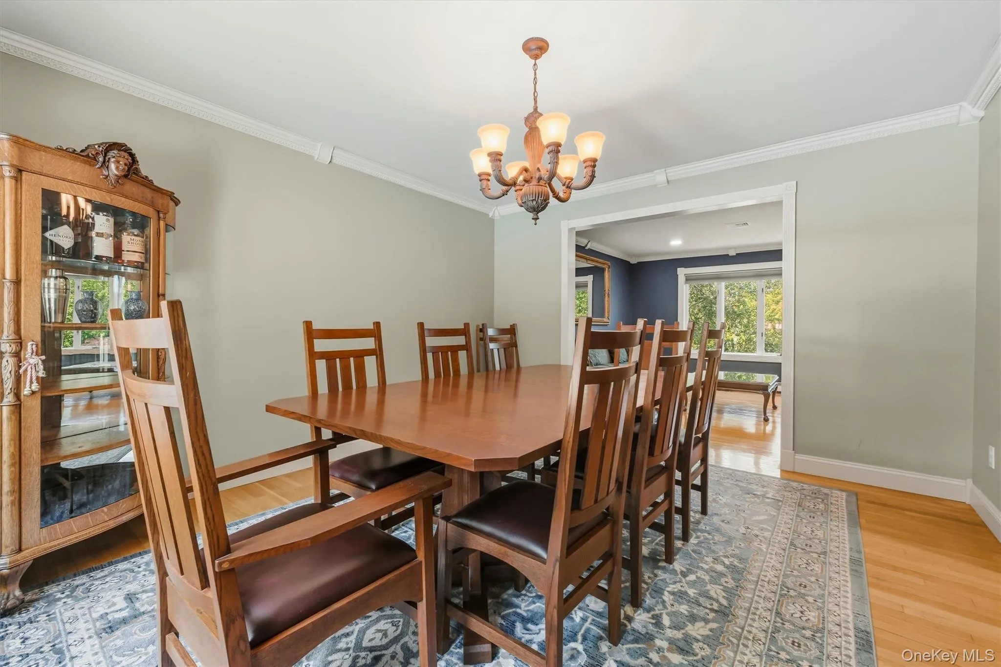 Formal dining room showing open airy doorway to the living room. Formal dining room showing open airy doorway to the living room.