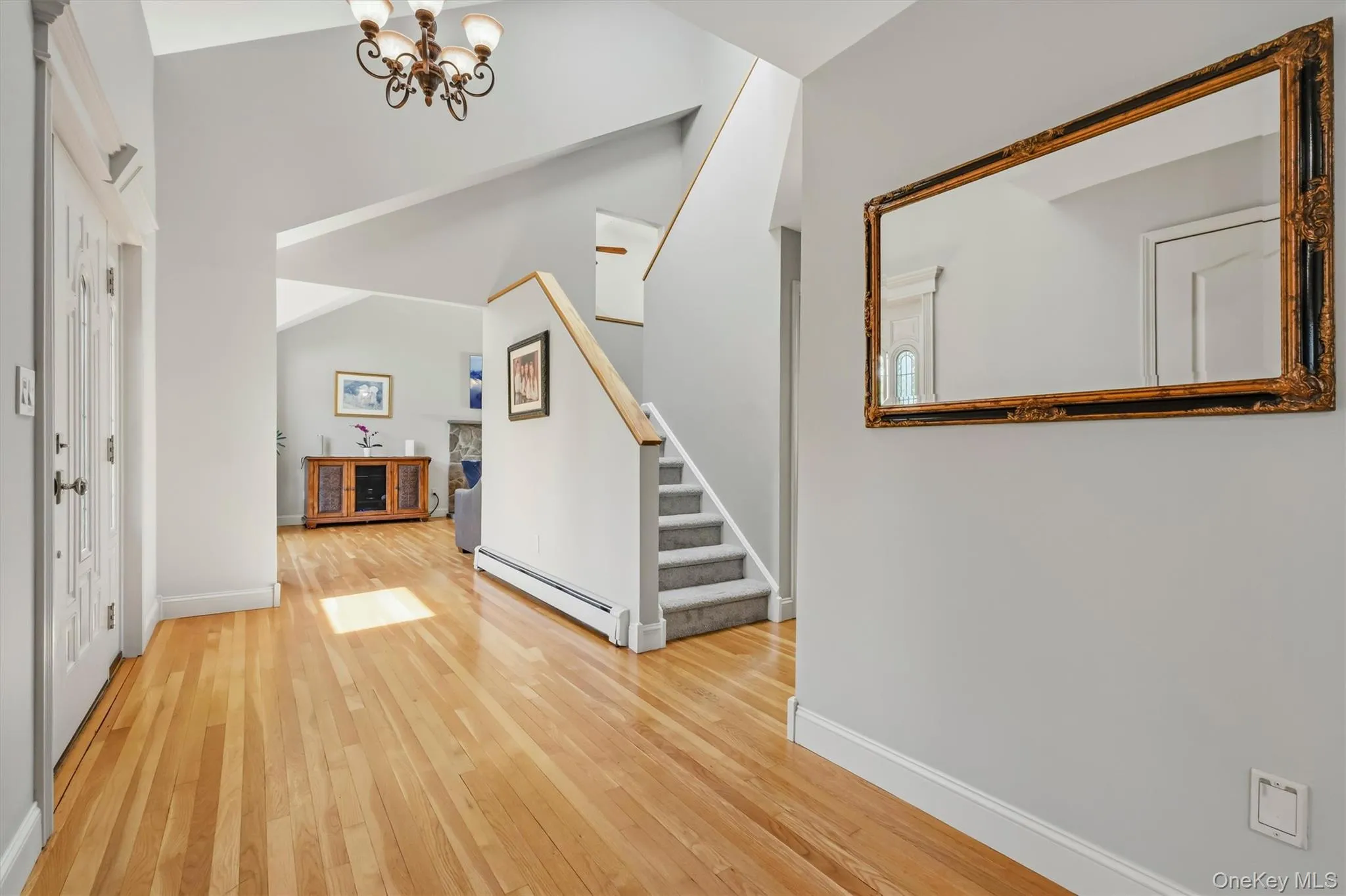 Two story entrance hall with rich hardwood floors. Two story entrance hall with rich hardwood floors.