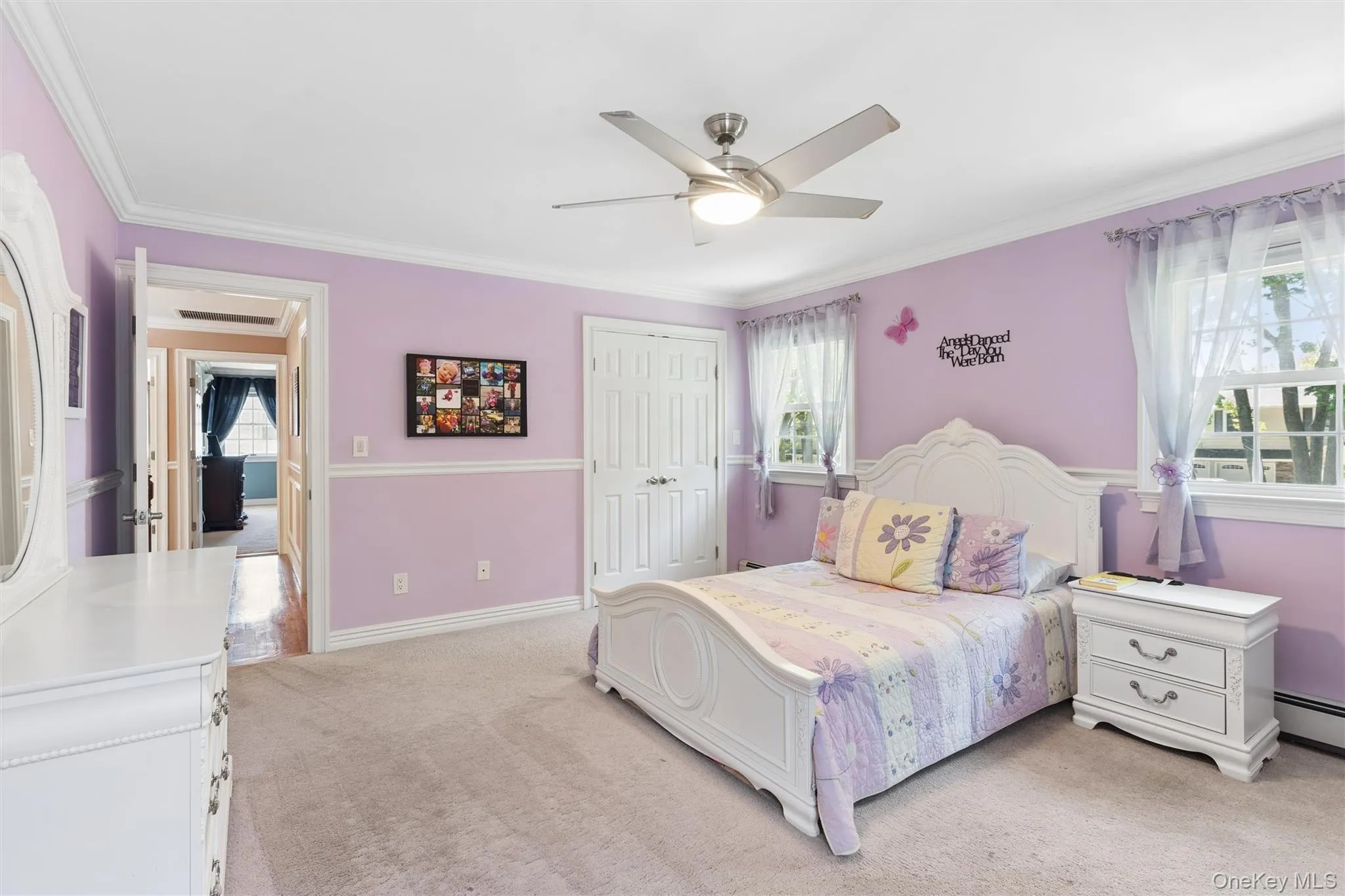 closet has custom shelving and crown moldings. closet has custom shelving and crown moldings.