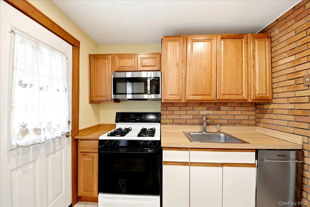 Appliances: Range, microwave and dishwasher Appliances: Range, microwave and dishwasher