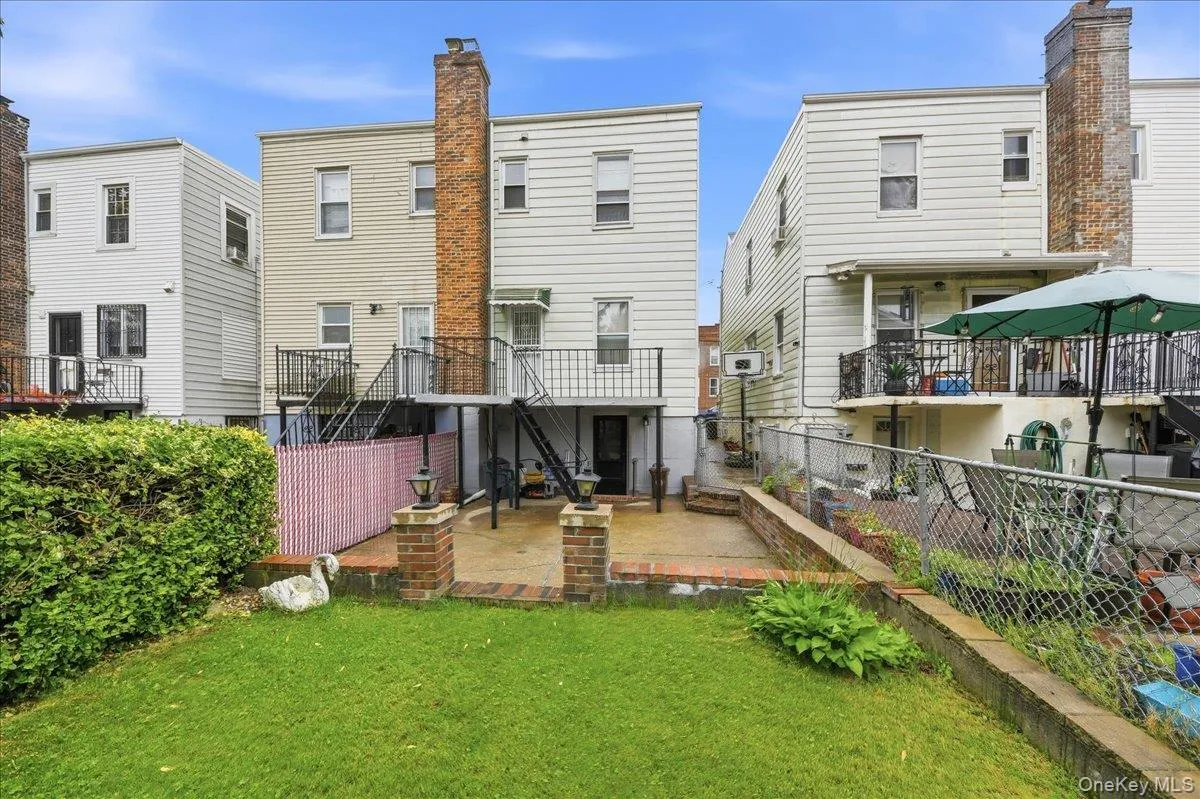 Lovely outdoor recreation space. Grassy yard, patio and open rear porch. Lovely outdoor recreation space. Grassy yard, patio and open rear porch.