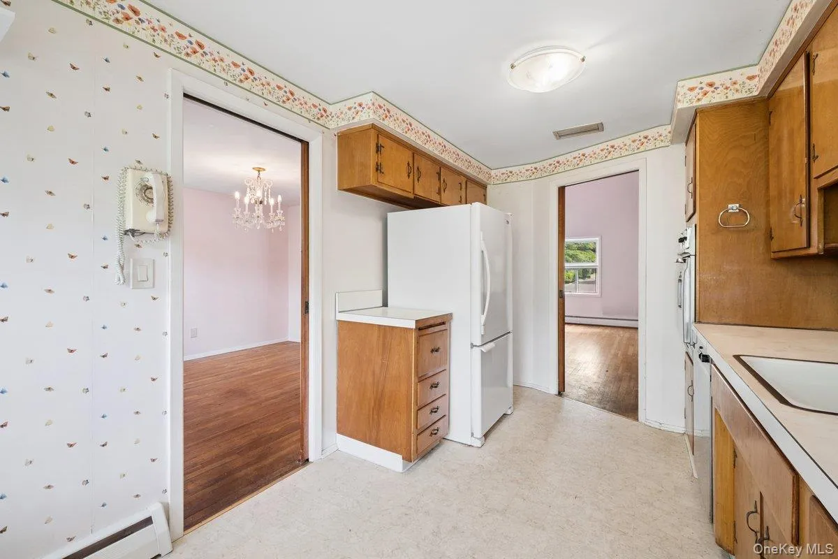 Dining Room just off kitchen on the left in photo Dining Room just off kitchen on the left in photo
