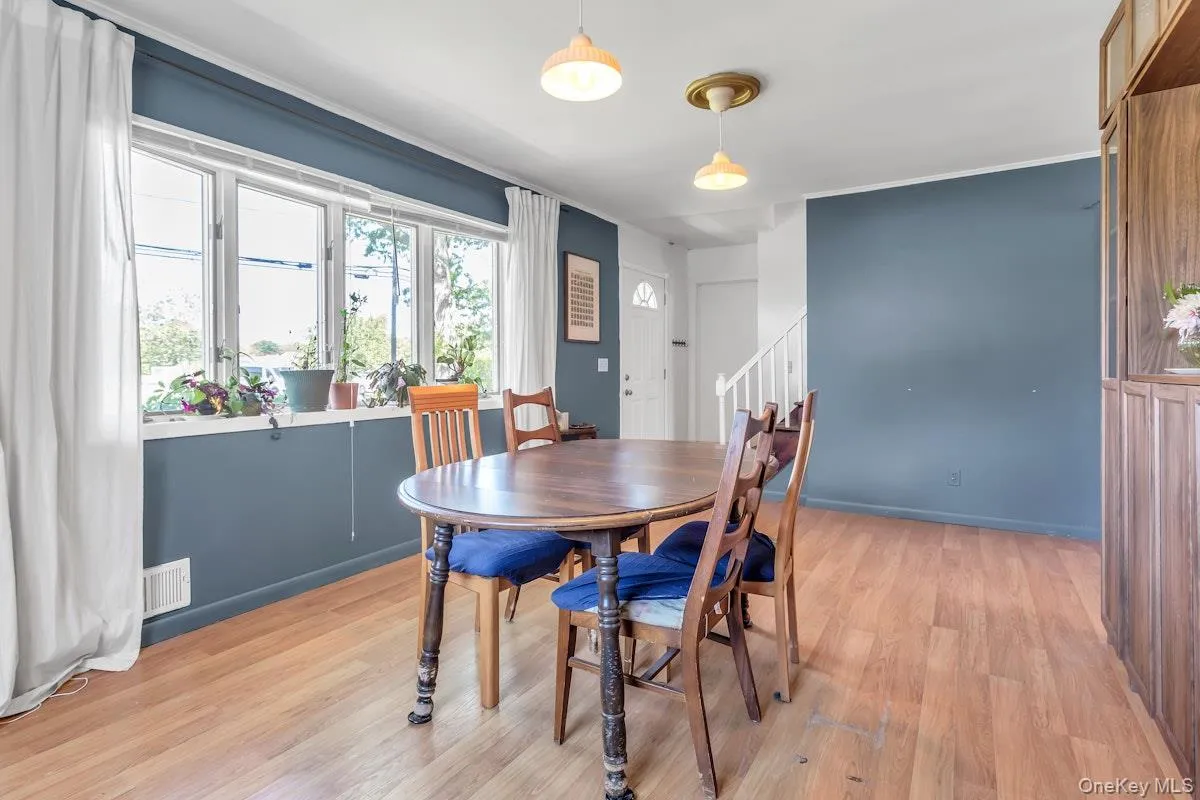 Dining Room shows Front Door and Staircase Dining Room shows Front Door and Staircase