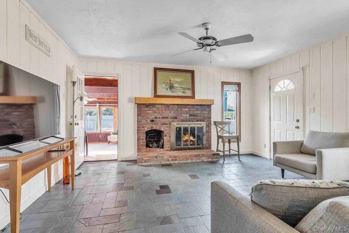 Family Room also has Door to Front and Door leading into Vaulted Enclosed Porch Family Room also has Door to Front and Door leading into Vaulted Enclosed Porch