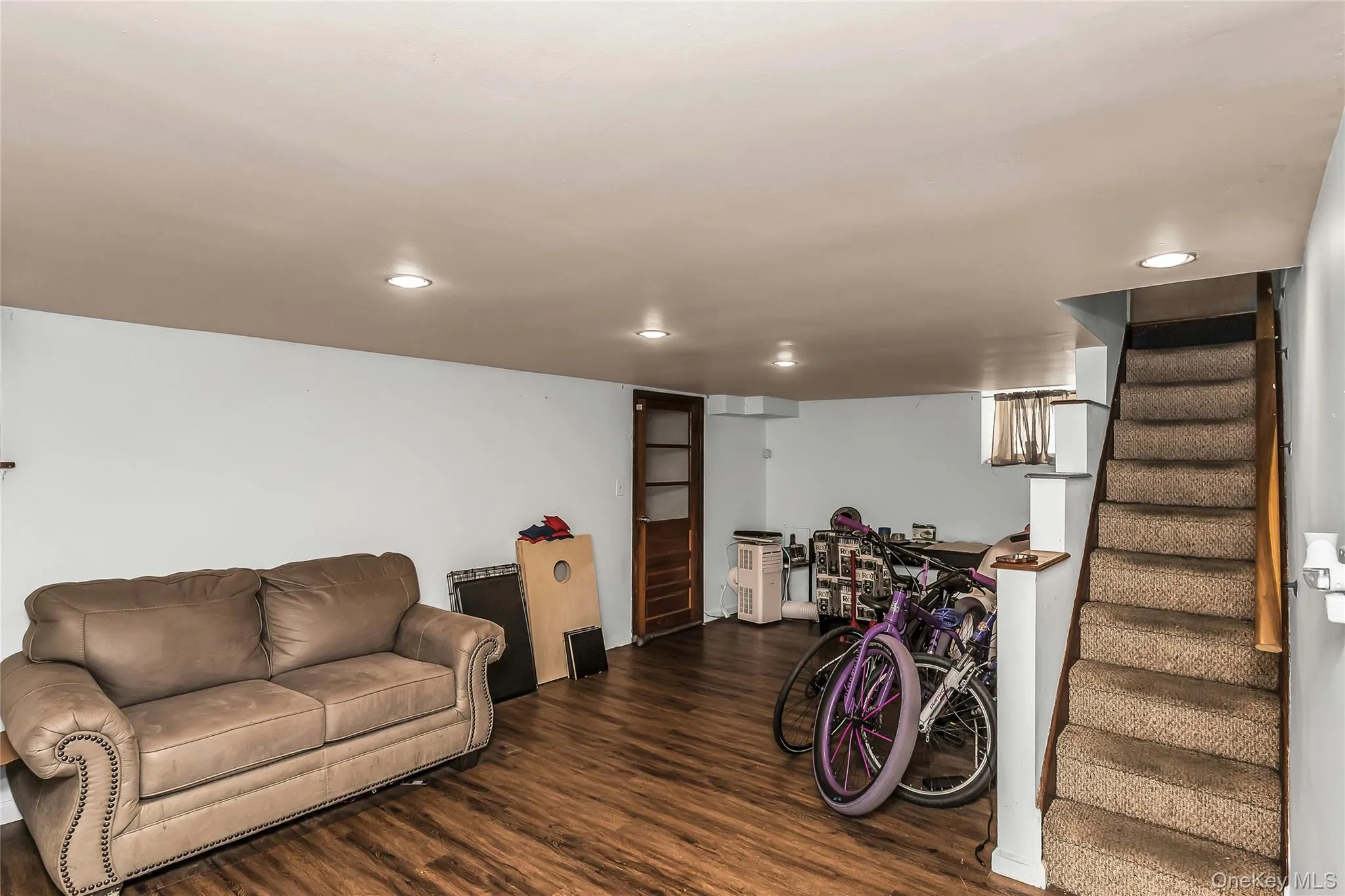 Storage/Laundry Room & Utilities with walk-out access to the backyard Storage/Laundry Room & Utilities with walk-out access to the backyard