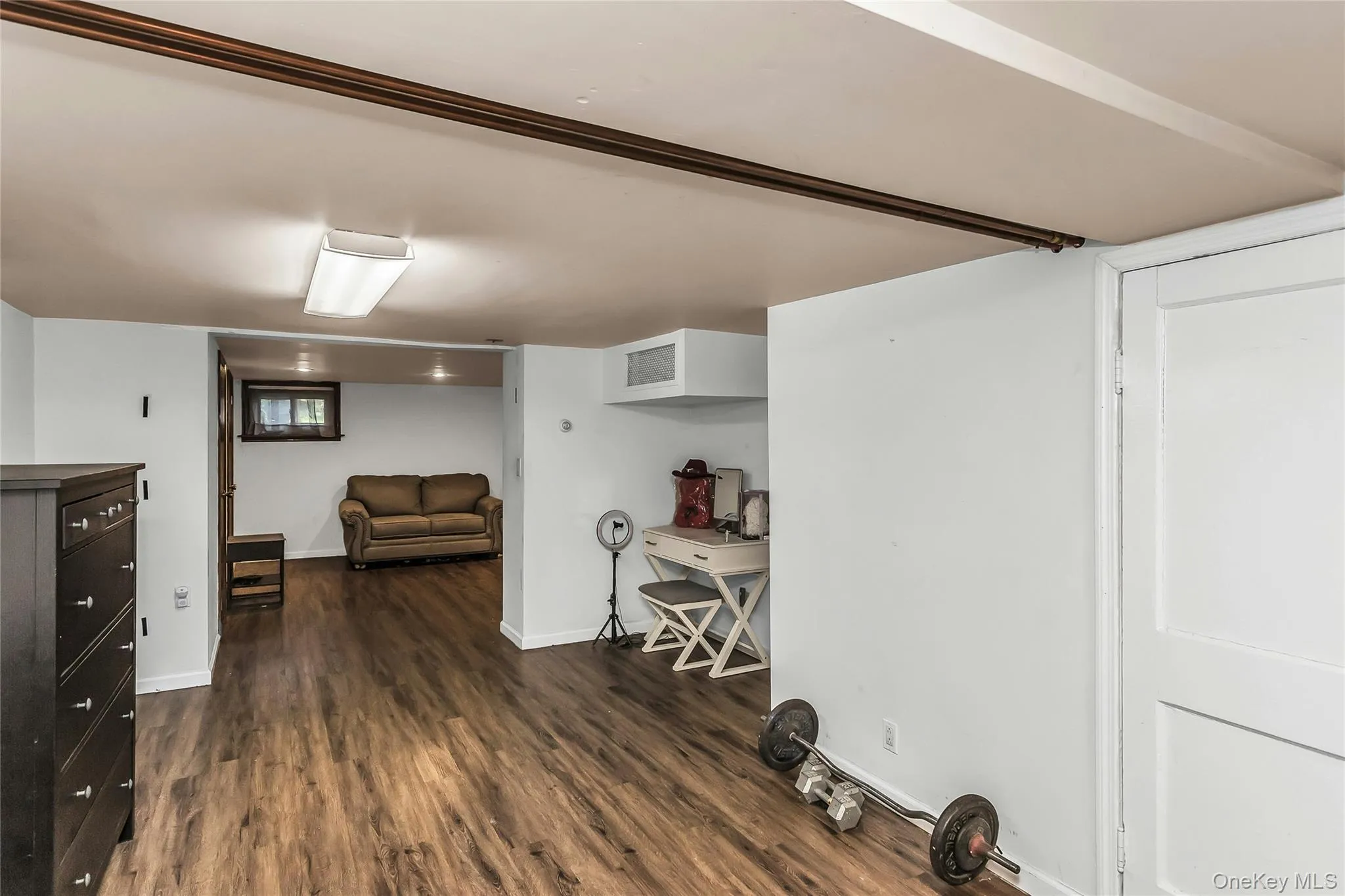 Storage/Laundry Room & Utilities with walk-out access to the backyard Storage/Laundry Room & Utilities with walk-out access to the backyard
