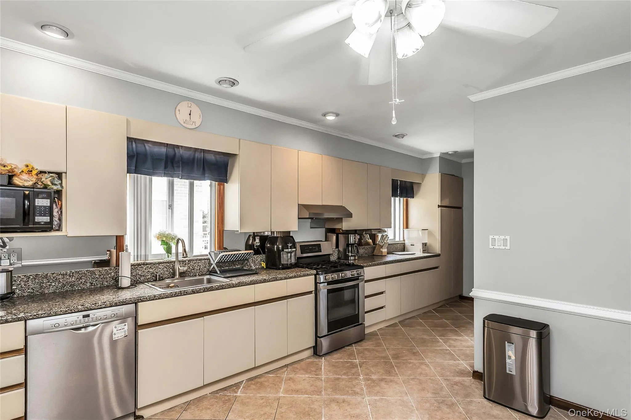 Spacious Eat-In Kitchen with stainless-steel appliances Spacious Eat-In Kitchen with stainless-steel appliances