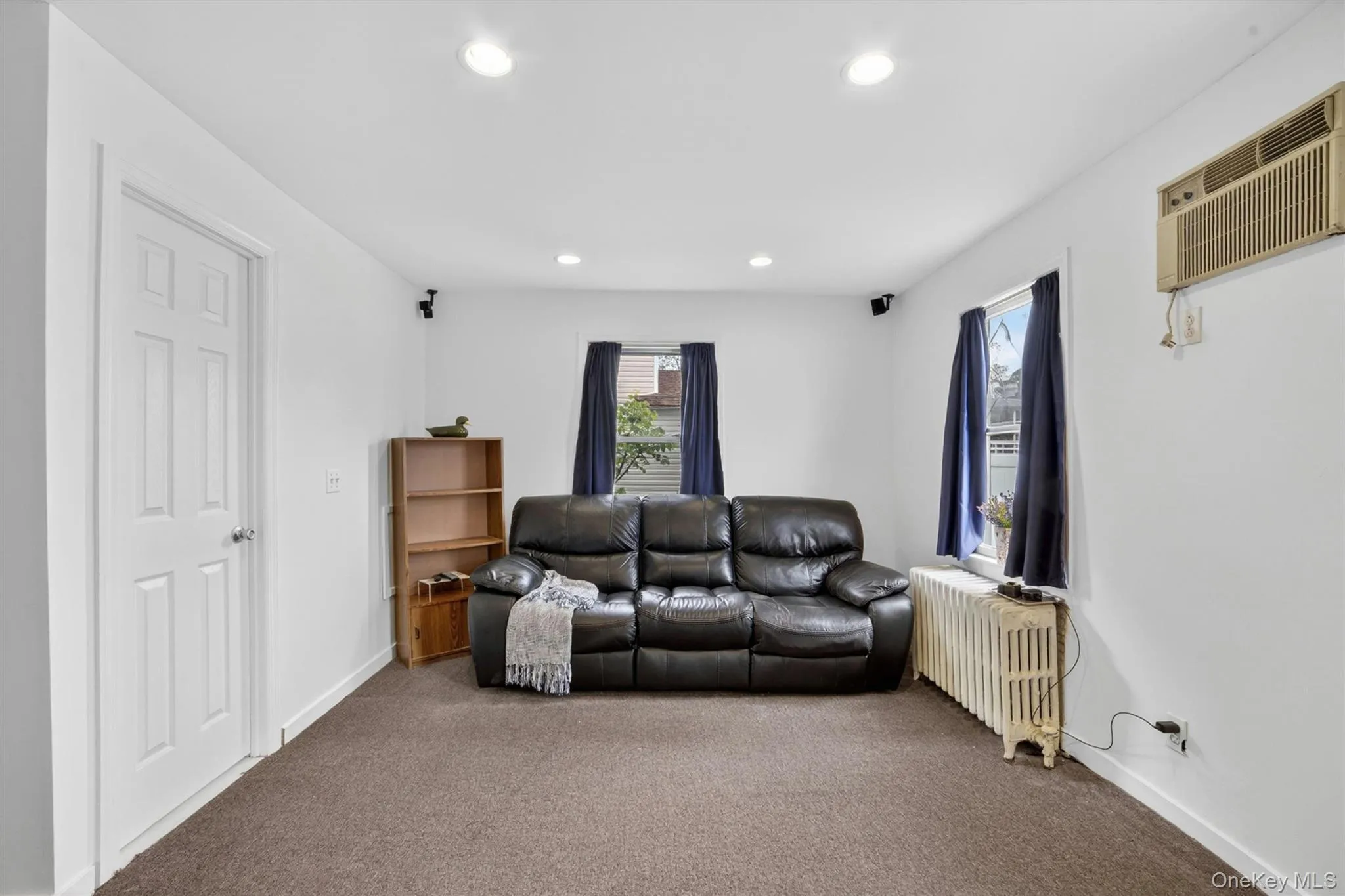First floor bedroom, currently used as a family room. First floor bedroom, currently used as a family room.