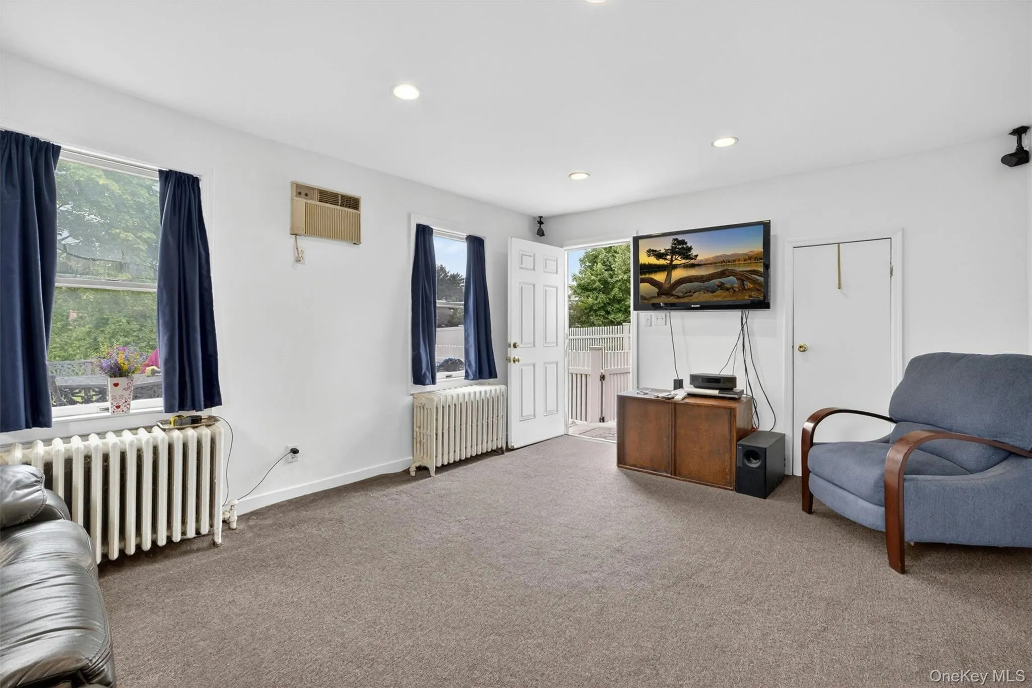 First floor bedroom, currently used as a family room. First floor bedroom, currently used as a family room.