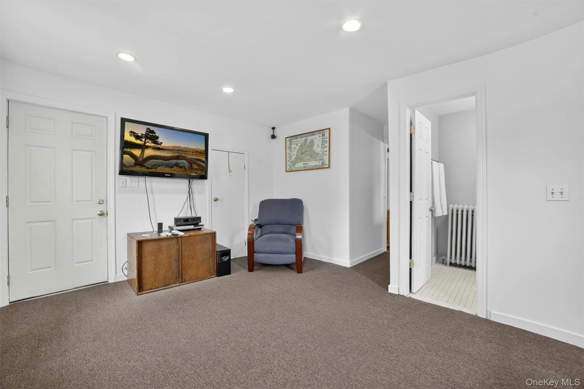 First floor bedroom, currently used as a family room. First floor bedroom, currently used as a family room.