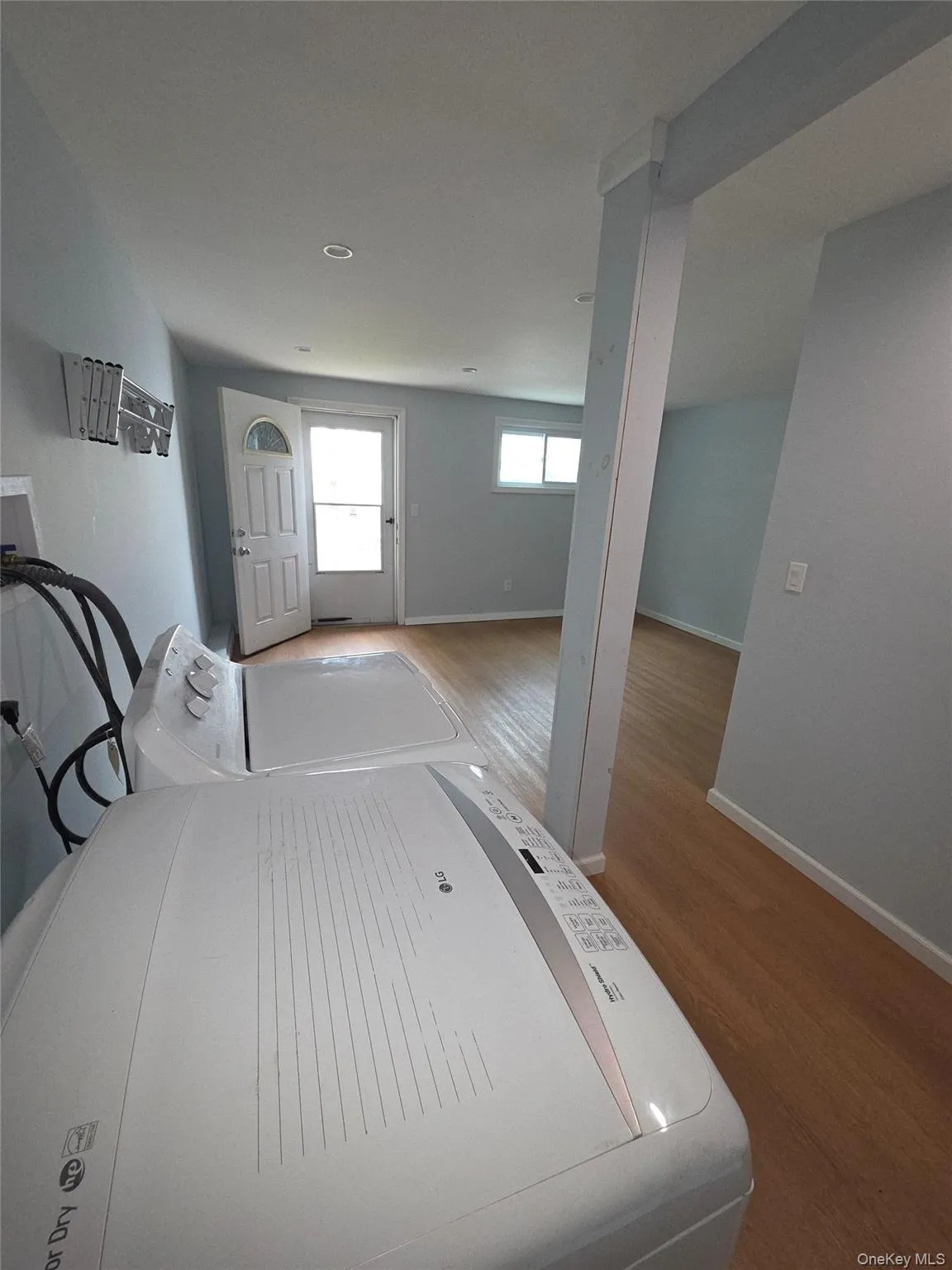 Downstairs Laundry and Extra Room w/exit to yard Downstairs Laundry and Extra Room w/exit to yard