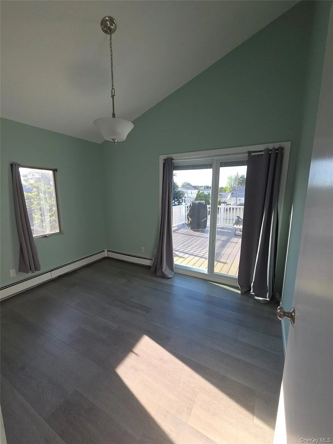Bedroom 5 - Sliding door exit to second floor deck Bedroom 5 - Sliding door exit to second floor deck
