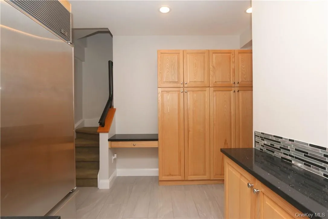 There is an abundance of cabinets including a large pantry closet. There is an abundance of cabinets including a large pantry closet.